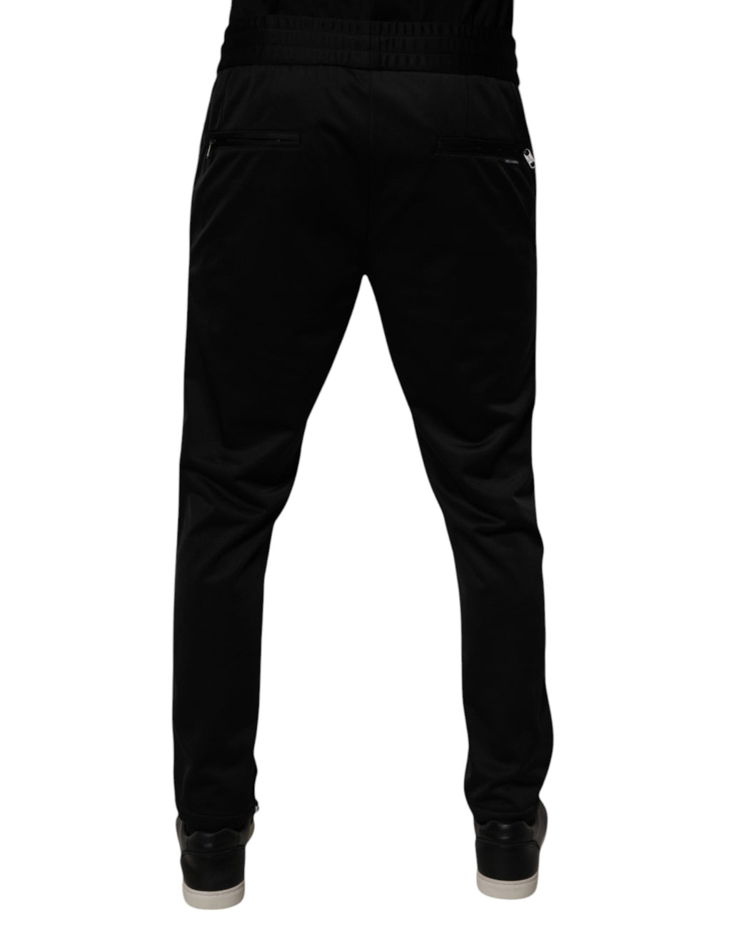 Pantalon jogger pour homme Dolce & Gabbana en polyester noir, style décontracté avec ceinture élastique et poches latérales.