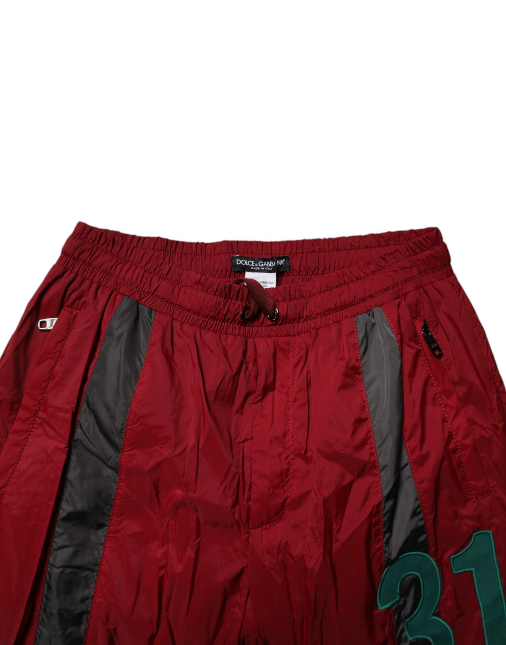 Pantalon jogger en nylon bordeaux pour homme de Dolce & Gabbana, style décontracté et confortable.