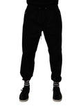 Pantalon jogger pour homme Dolce & Gabbana en coton noir, style décontracté avec cordons à la taille et poches latérales.