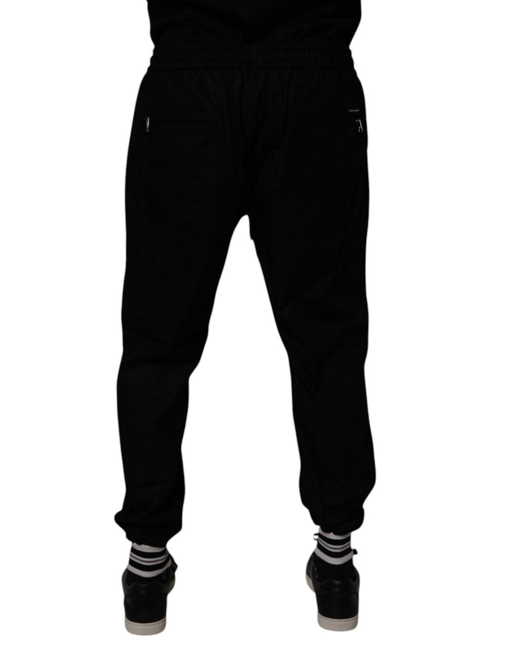 Pantalon jogging homme Dolce & Gabbana en coton noir, style décontracté et confortable, avec poches latérales.