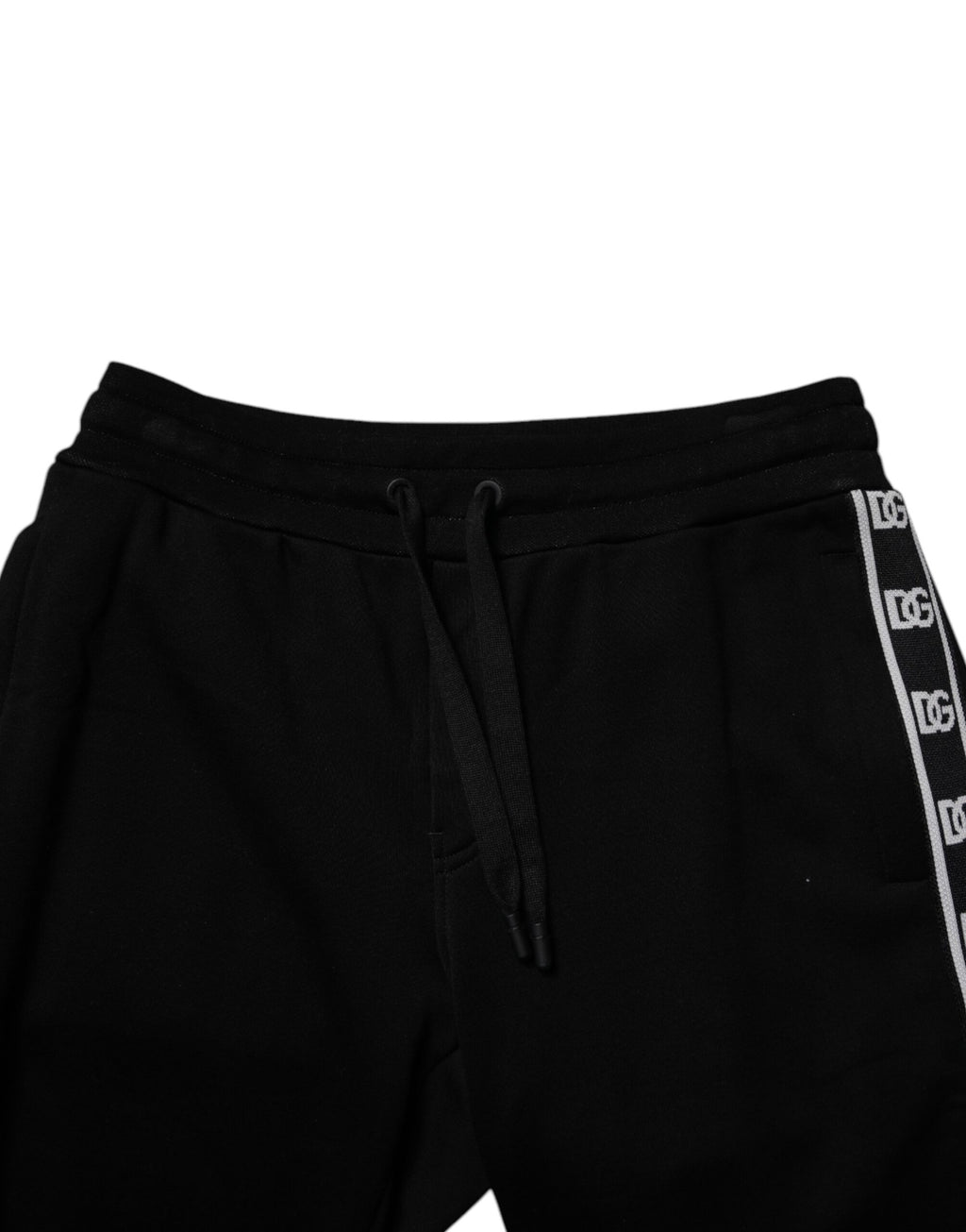 Pantalon de survêtement court en coton mélangé noir de Dolce & Gabbana, avec coupe décontractée et détails modernes.