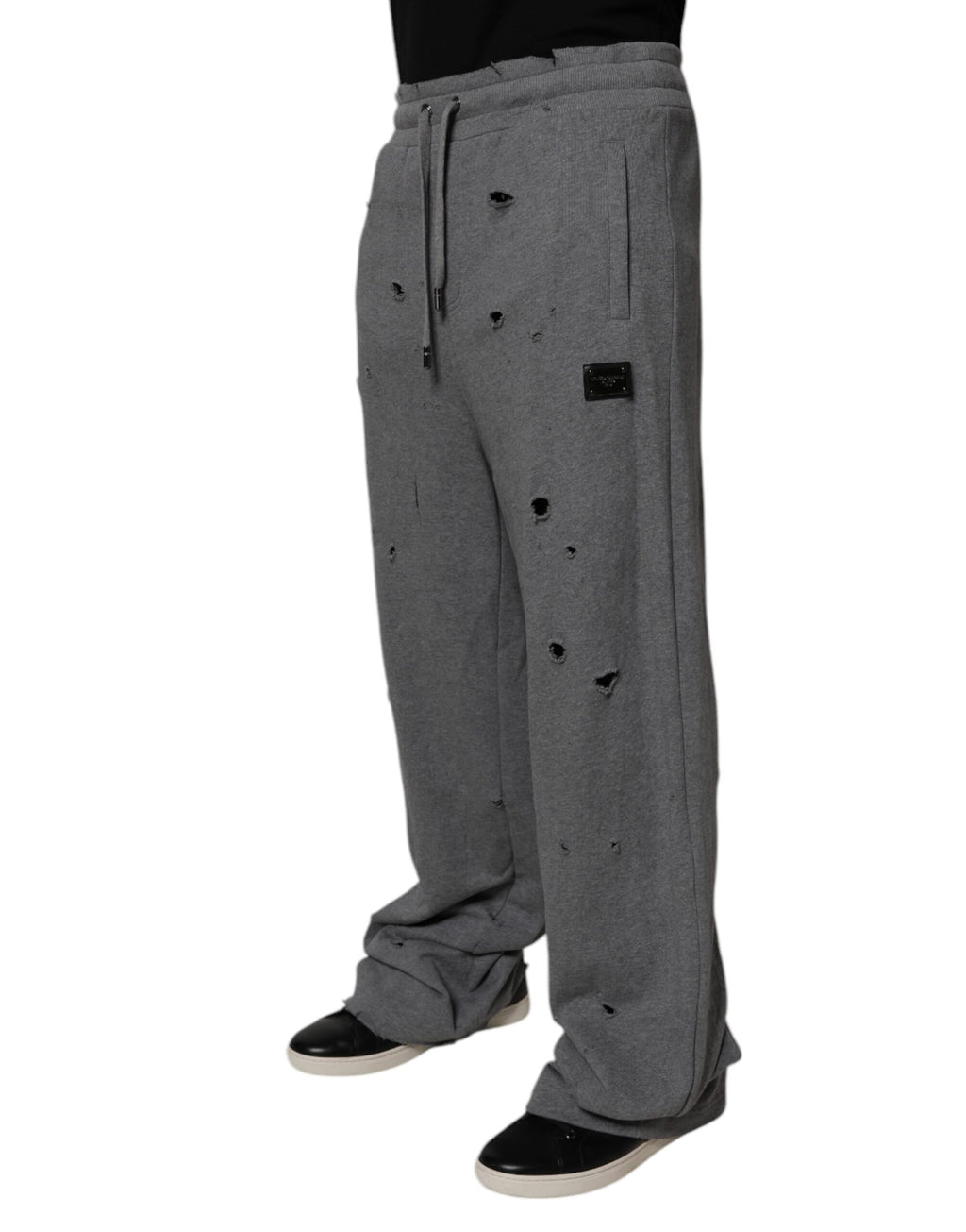Pantalon de survêtement droit en coton gris Dolce & Gabbana RipStyle, vue de face, avec détails de couture visible.