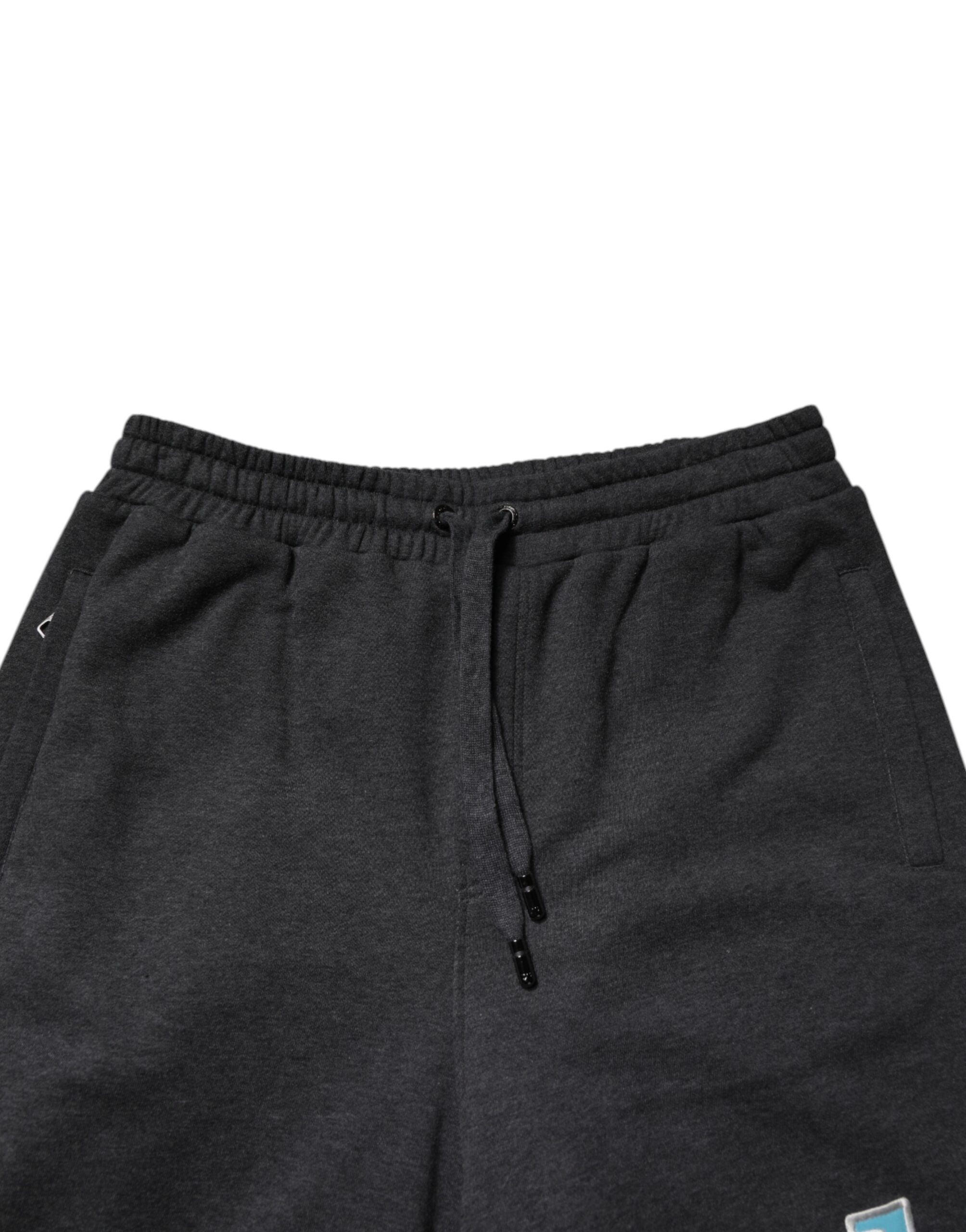 Pantalons de survêtement en coton gris foncé Dolce & Gabbana, coupe droite avec superposition élégante, pour un style décontracté.