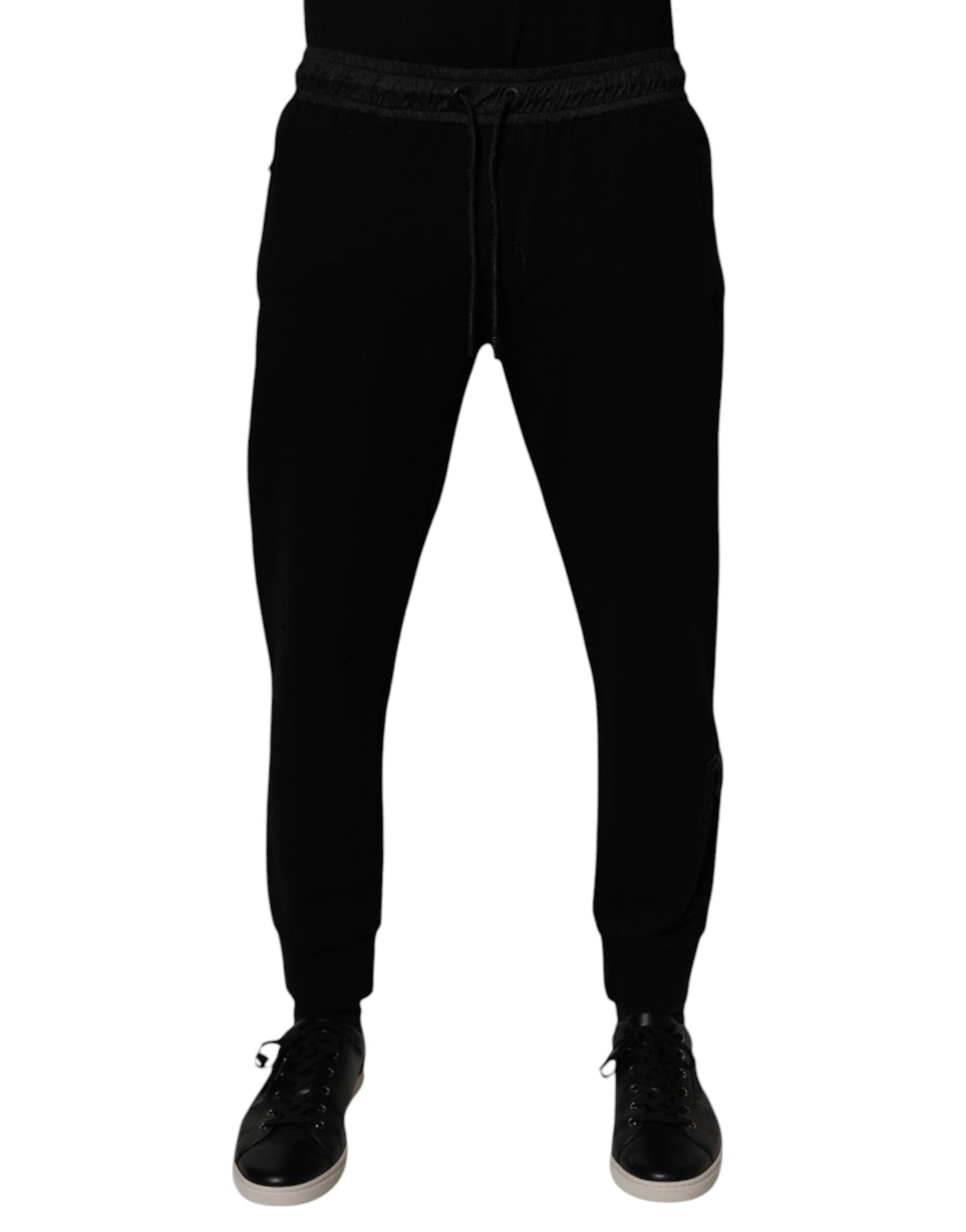 Pantalon de jogging pour homme Dolce & Gabbana, en coton mélangé noir, avec taille élastique et poches latérales.