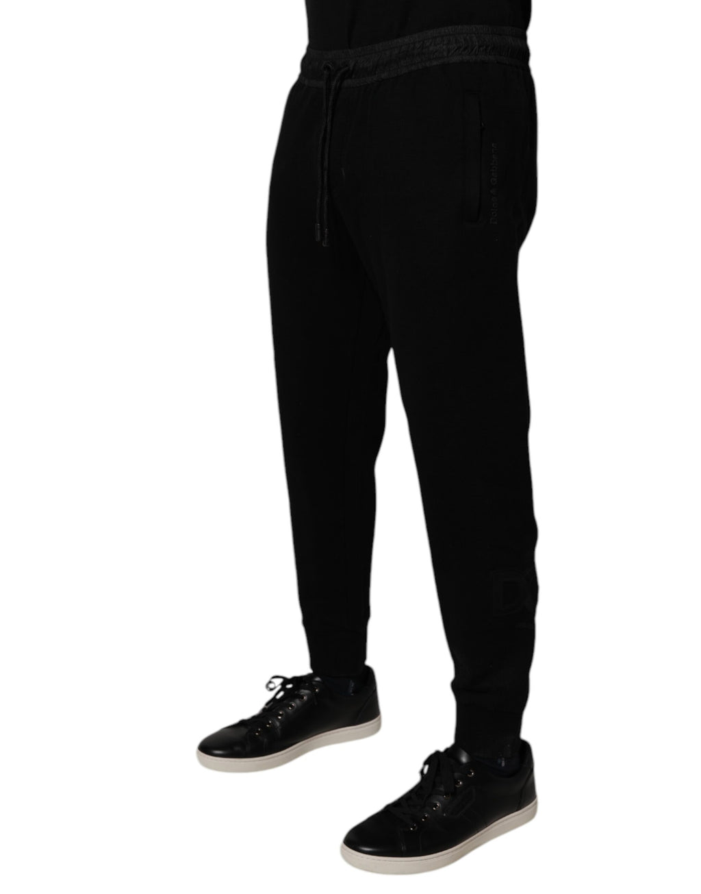 Pantalon jogging pour homme Dolce & Gabbana en coton mélangé noir, style décontracté avec taille élastique et poches.