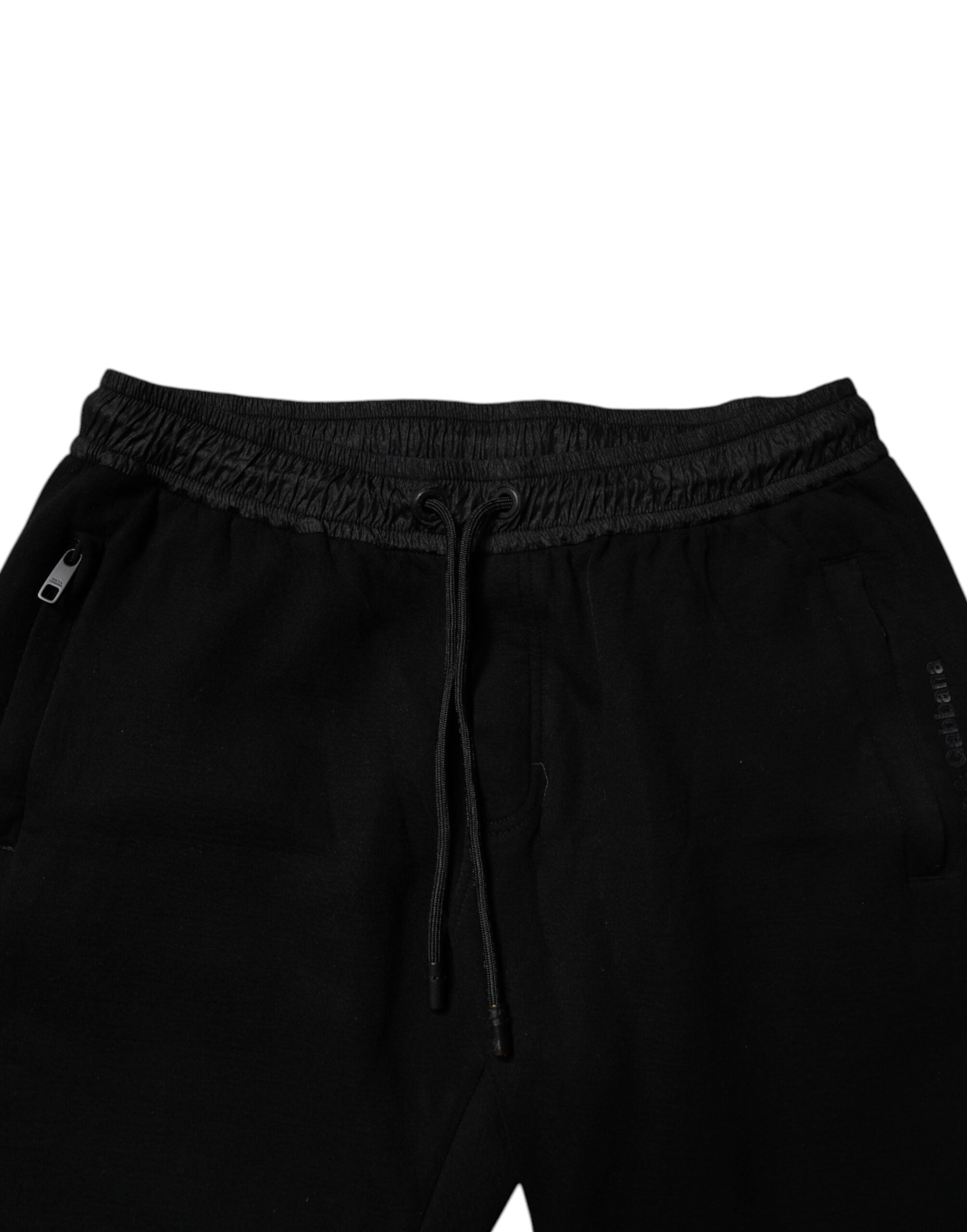 Pantalon jogger pour homme Dolce & Gabbana en coton mélangé noir avec cordons de serrage et poches latérales.