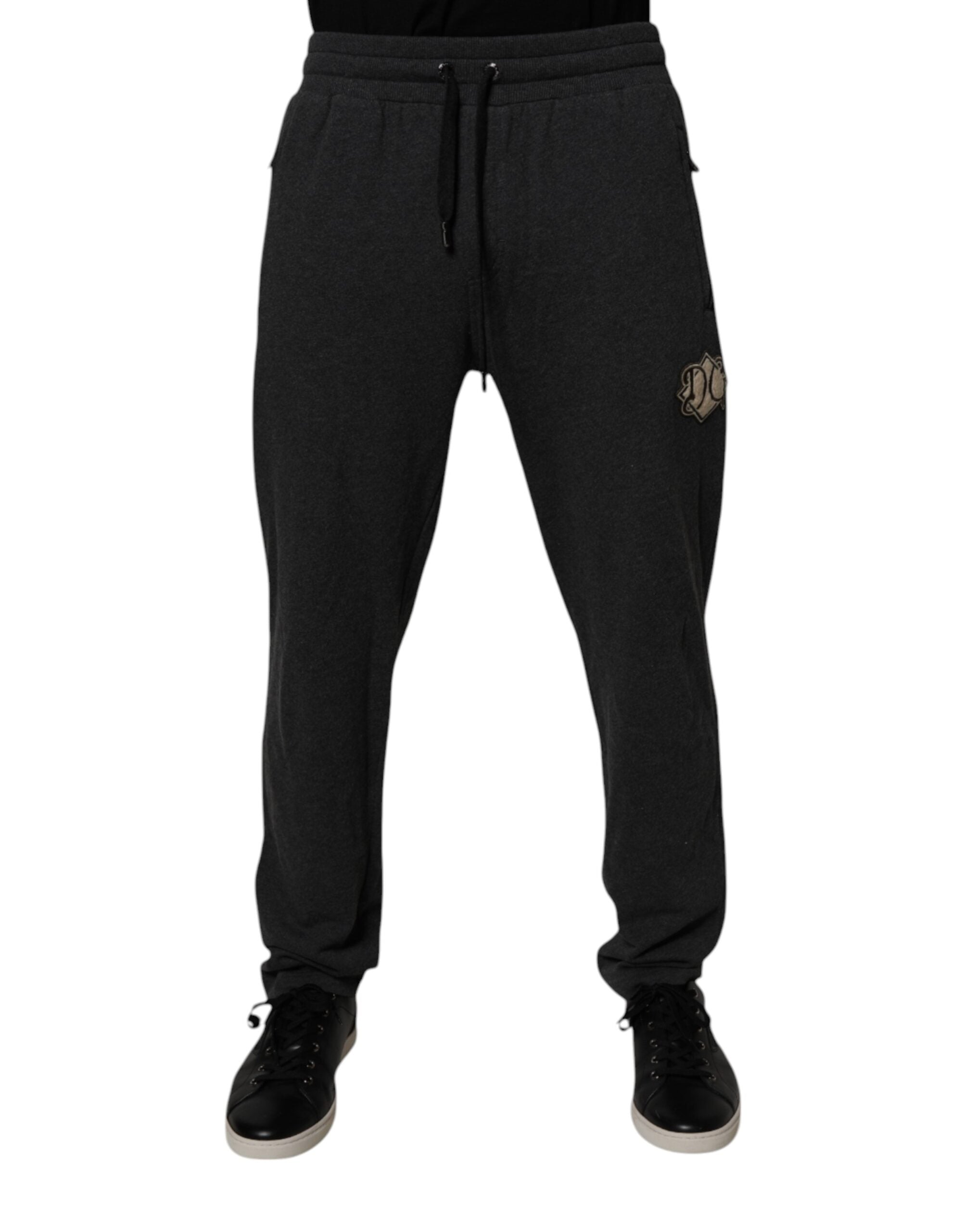 Pantalon jogger en coton gris foncé Dolce & Gabbana avec logo, look décontracté, poche latérale et taille à cordon.