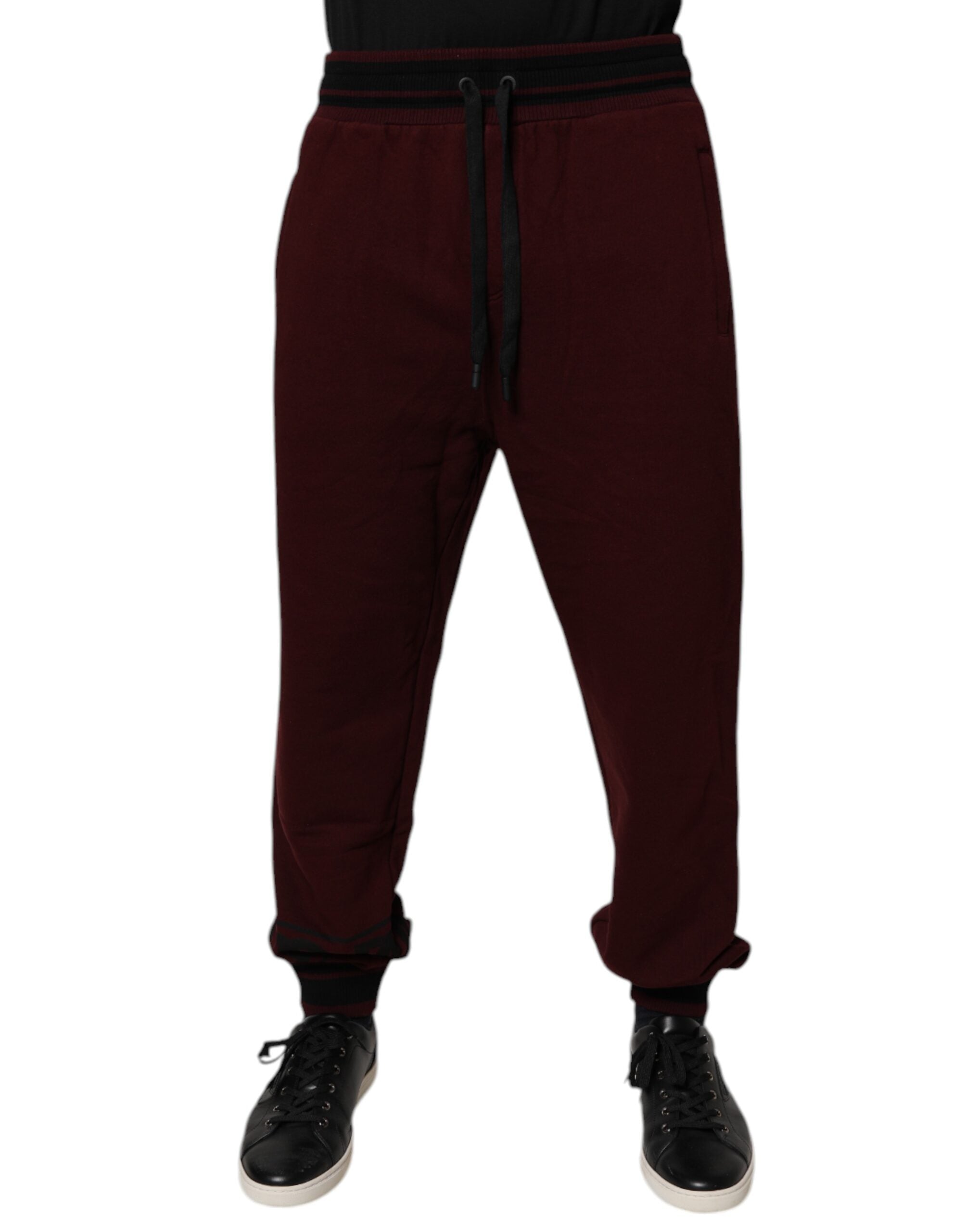 Joggeurs pour hommes Dolce & Gabbana en coton bordeaux, pantalon de sport décontracté avec ceinture élastique et poches latérales.