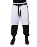 Pantalon de sweat en coton noir et blanc Dolce & Gabbana avec superpositions, style décontracté et moderne.