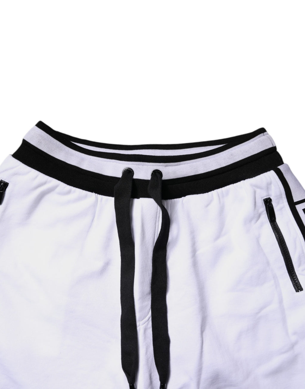 Pantalons de sweat Dolce & Gabbana en coton noir et blanc, avec coupe superposée et design décontracté.