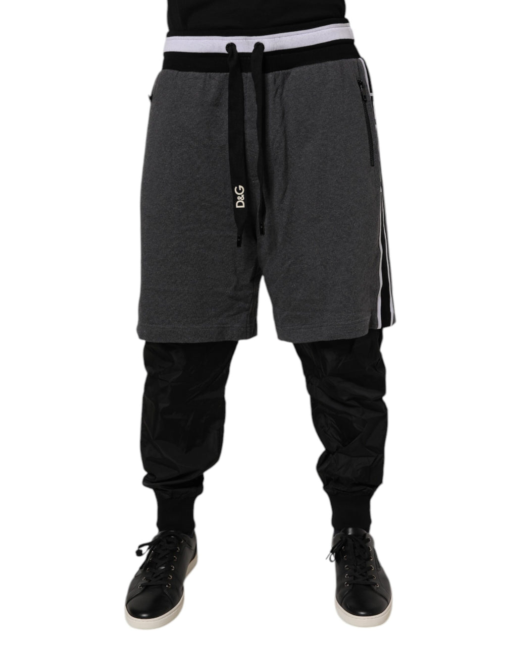 Pantalons sweat homme Dolce & Gabbana en coton noir et gris, coupe superposée et décontractée.