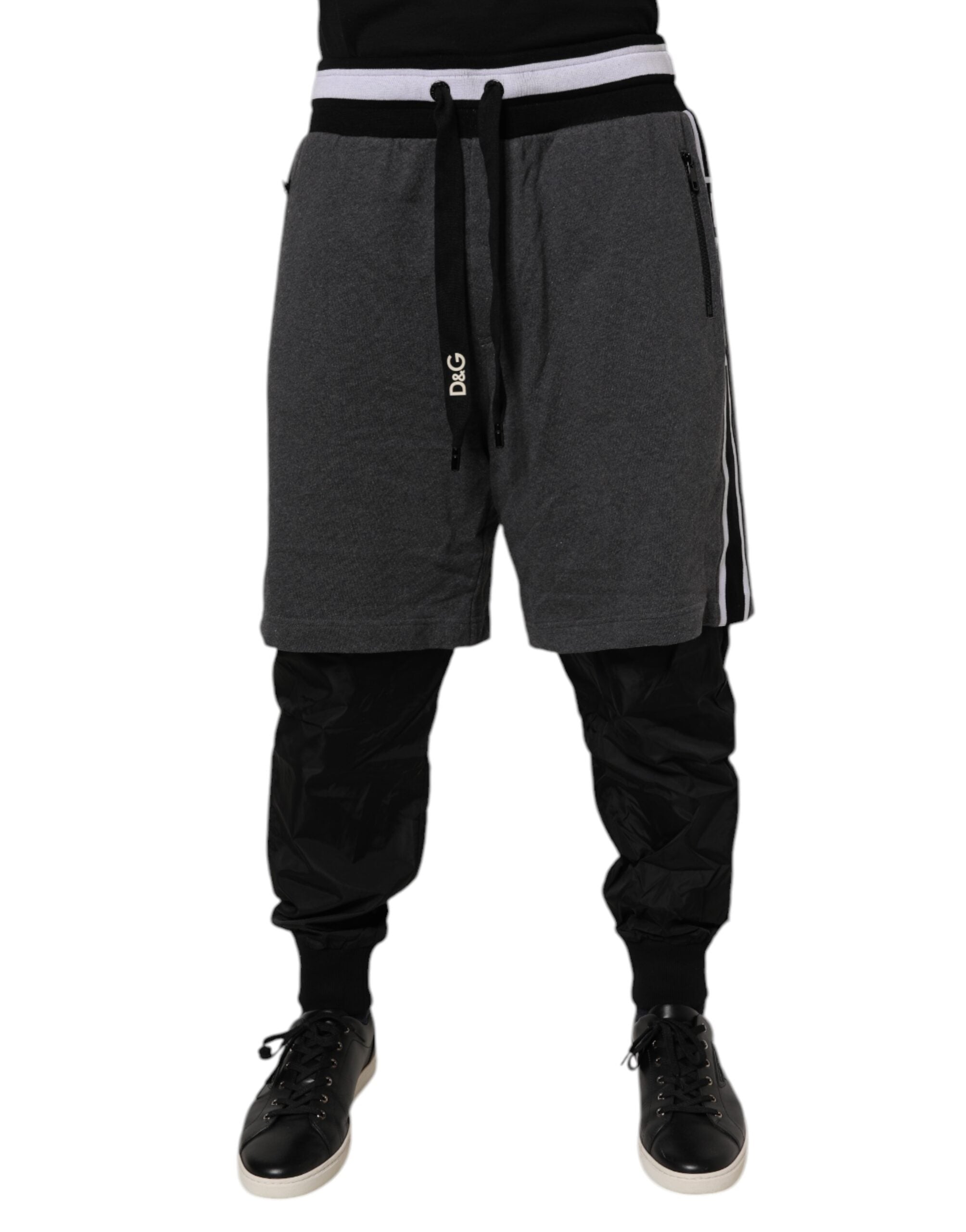 Pantalons sweat homme Dolce & Gabbana en coton noir et gris, coupe superposée et décontractée.