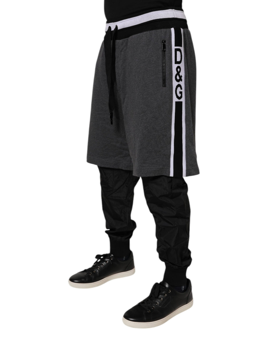 Pantalon de survêtement noir et gris en coton pour homme de Dolce & Gabbana, avec couche superposée élégante.