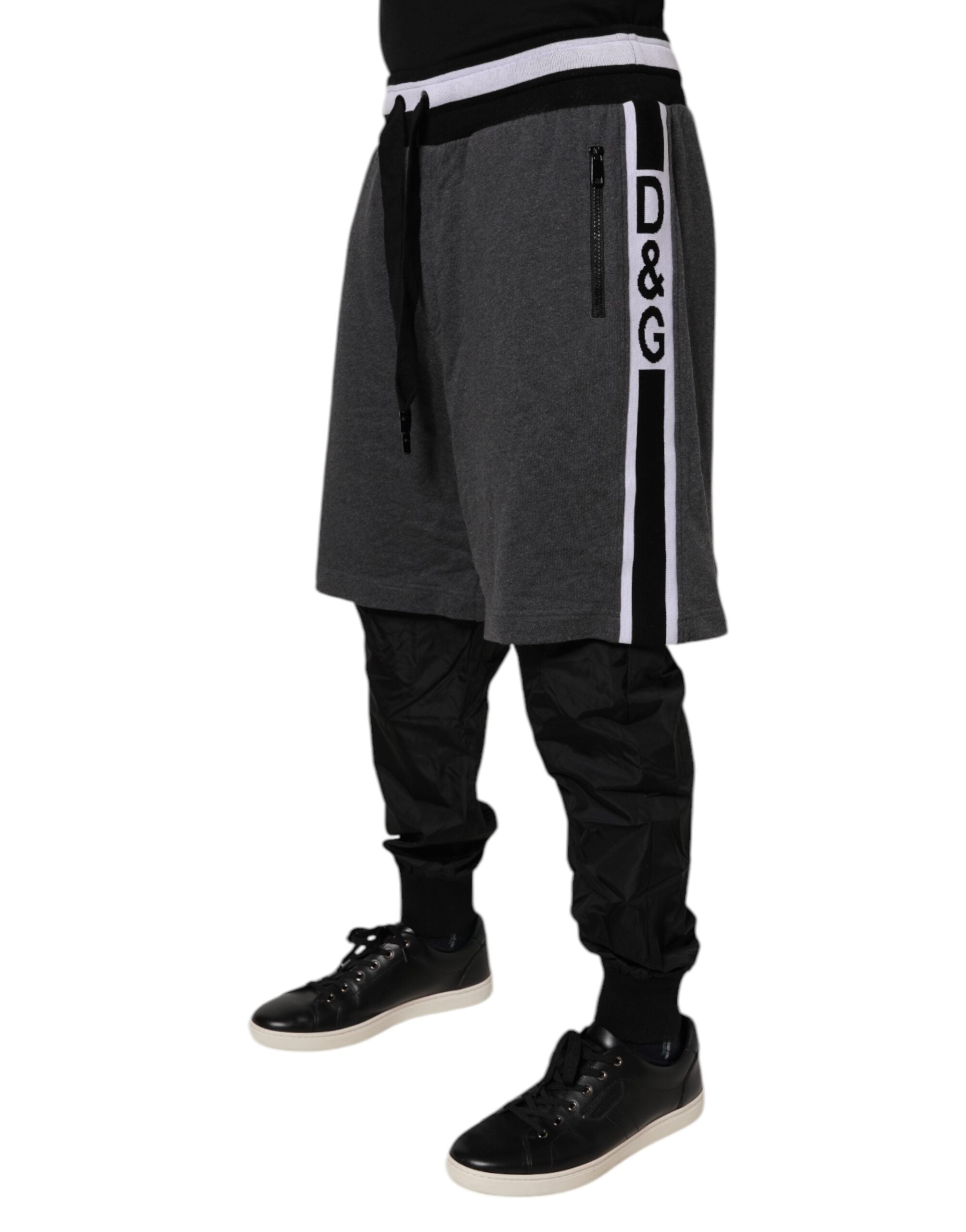 Pantalon de survêtement noir et gris en coton pour homme de Dolce & Gabbana, avec couche superposée élégante.