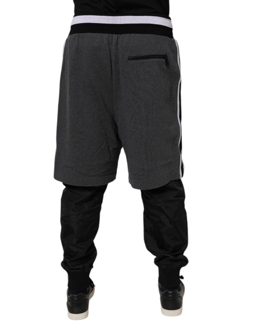 Pantalons de jogging pour homme Dolce & Gabbana en coton noir et gris, superposés, style décontracté et moderne.