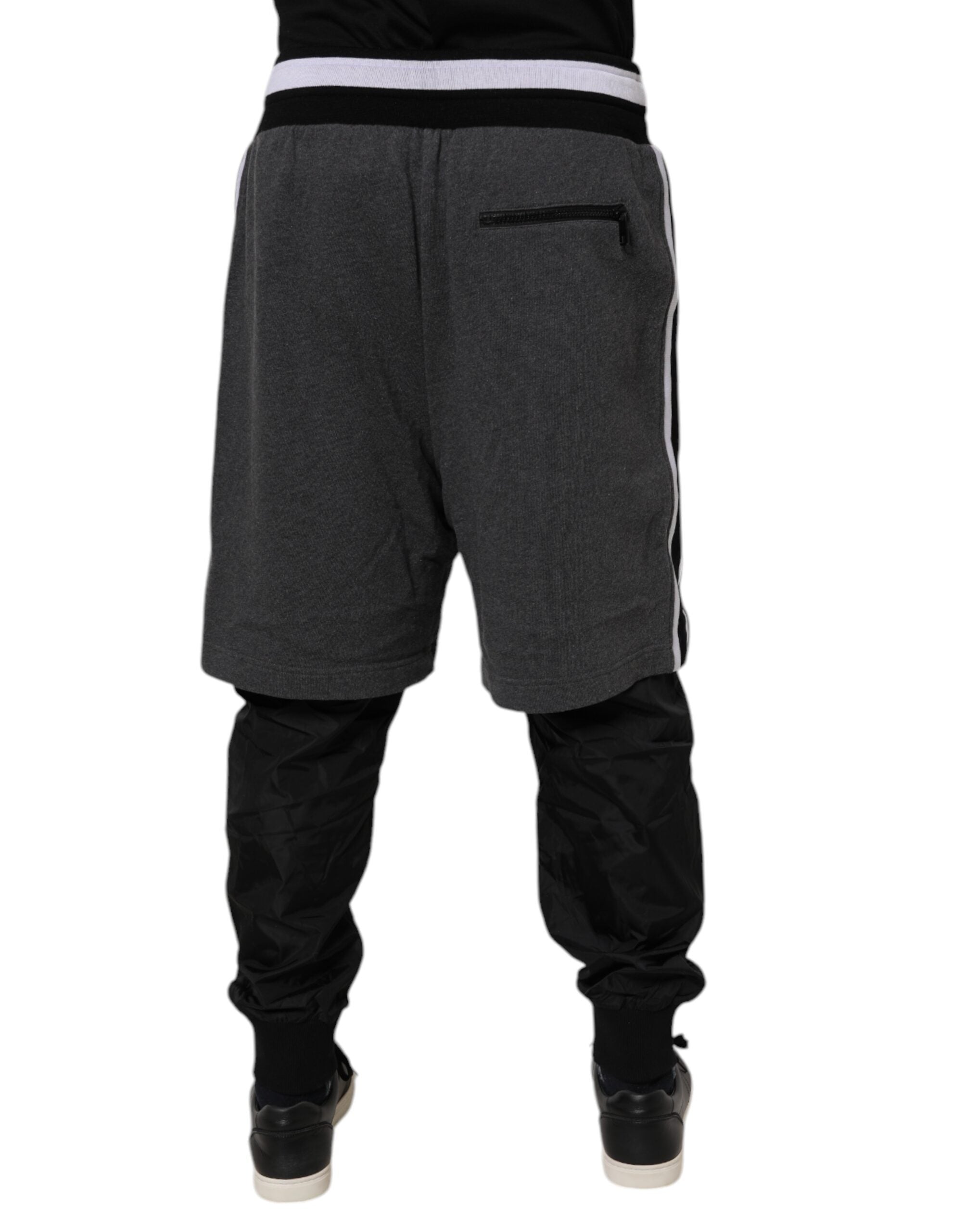 Pantalons de jogging pour homme Dolce & Gabbana en coton noir et gris, superposés, style décontracté et moderne.