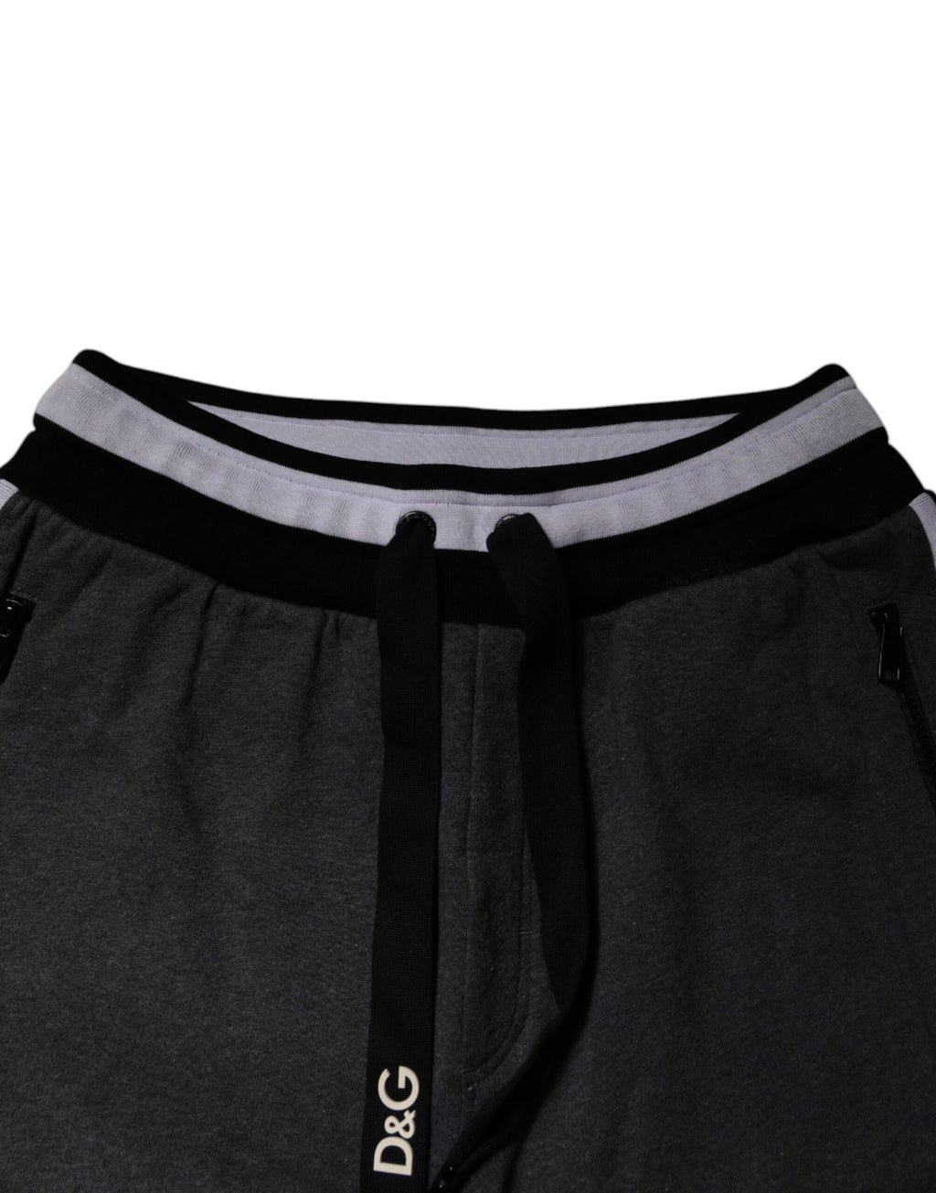 Pantalons de jogging pour hommes Dolce & Gabbana en coton noir et gris avec superpositions, style décontracté et moderne.