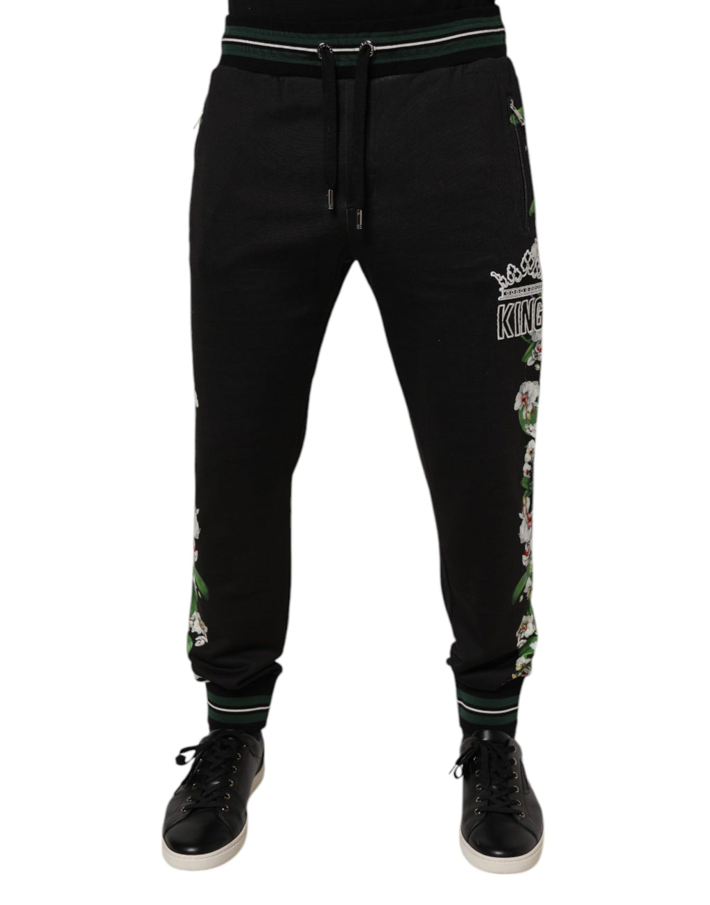 Pantalon jogger Dolce & Gabbana pour homme, sweatpants noirs à motifs floraux, style décontracté et élégant.