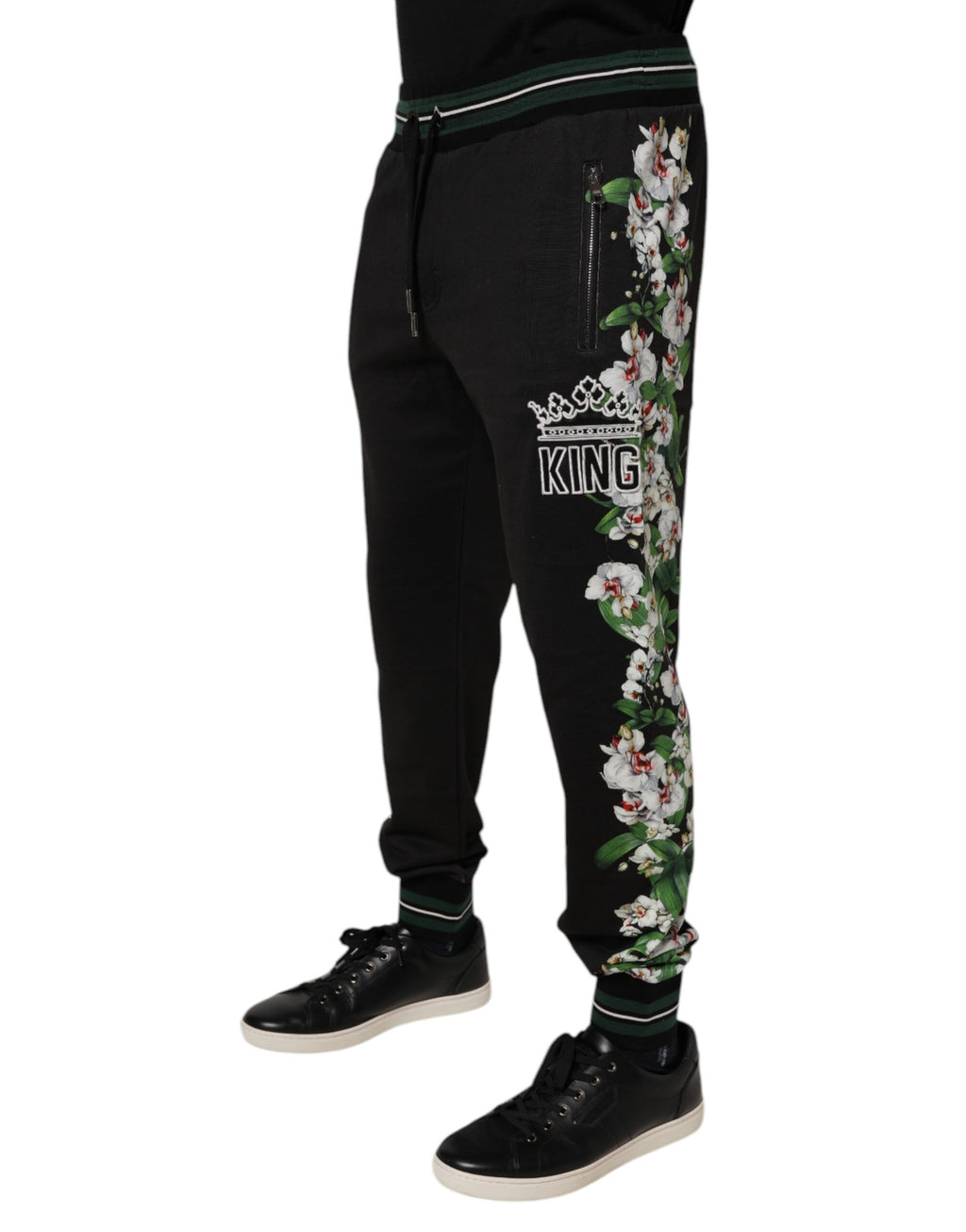 Pantalons jogger pour homme Dolce & Gabbana noirs avec motif floral, style décontracté et confortable.