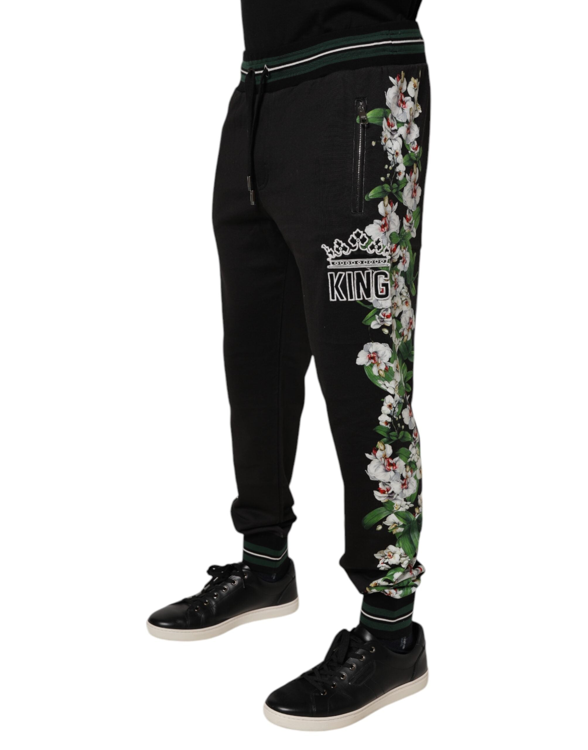 Pantalons jogger pour homme Dolce & Gabbana noirs avec motif floral, style décontracté et confortable.