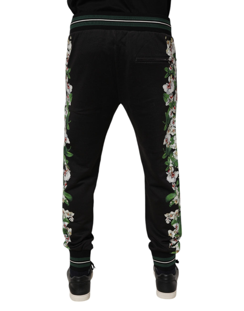 Pantalon jogger Dolce & Gabbana pour homme, noir avec motif floral, confortable et décontracté, en tissu doux.