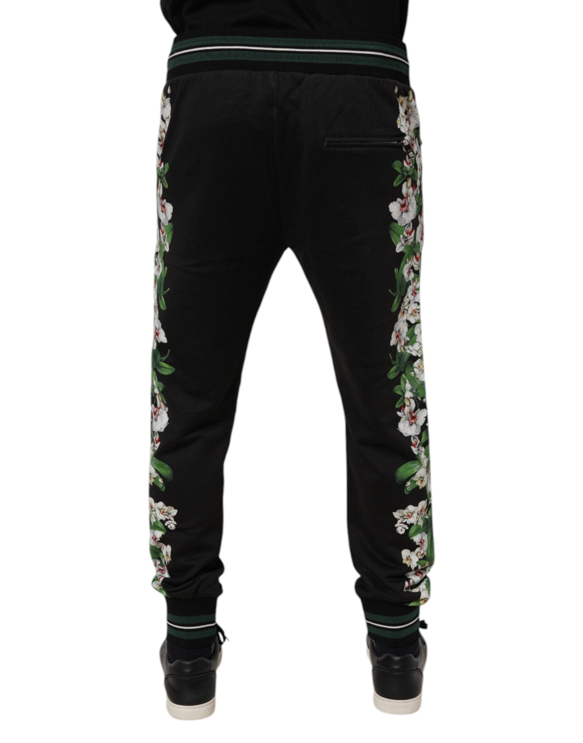 Pantalon jogger Dolce & Gabbana pour homme, noir avec motif floral, confortable et décontracté, en tissu doux.