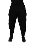 Pantalon cargo jogger pour homme de marque Dolce & Gabbana, en coton noir, style décontracté et confortable.