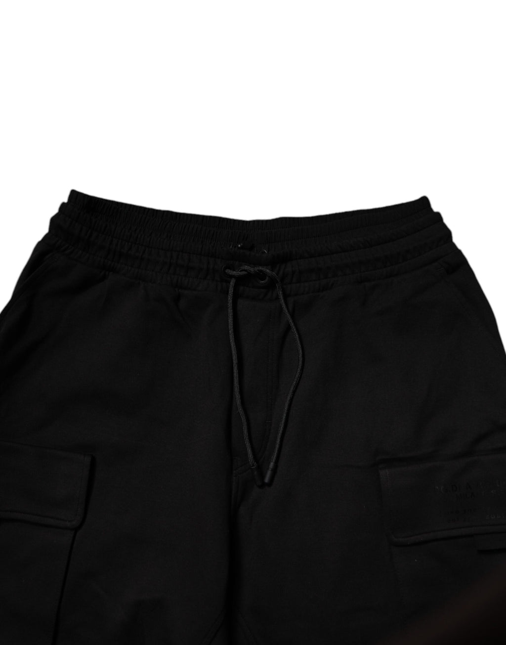 Pantalon cargo jogger pour homme en coton noir de Dolce & Gabbana, style décontracté avec poches latérales.