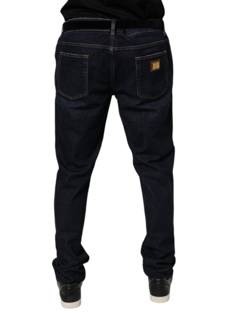 Jeans skinny en denim coton stretch bleu foncé de Dolce & Gabbana, visibles détails et coupe ajustée.