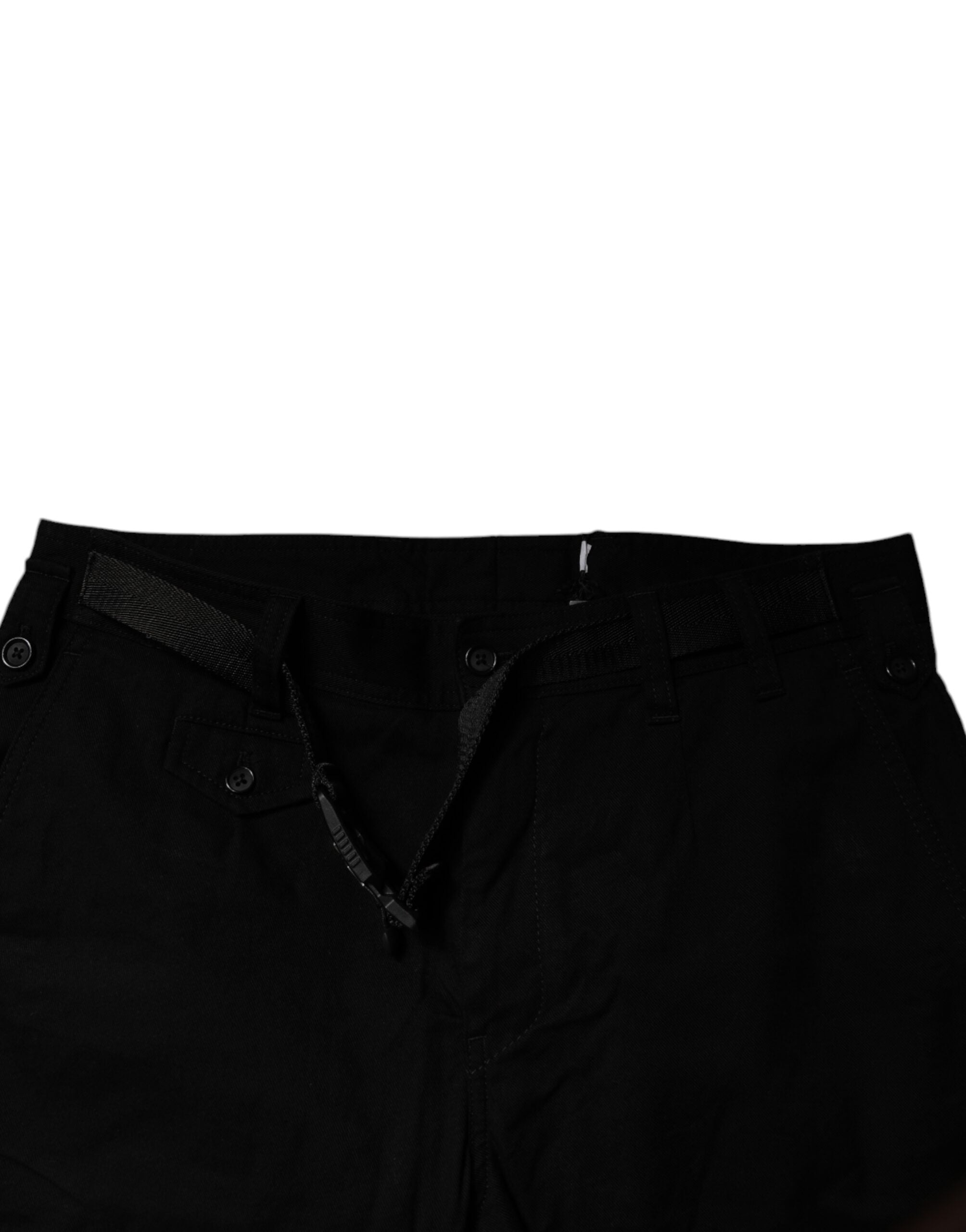 Jean cargo skinny en denim noir en coton stretch de Dolce & Gabbana, fermetures et détails modernes visibles.