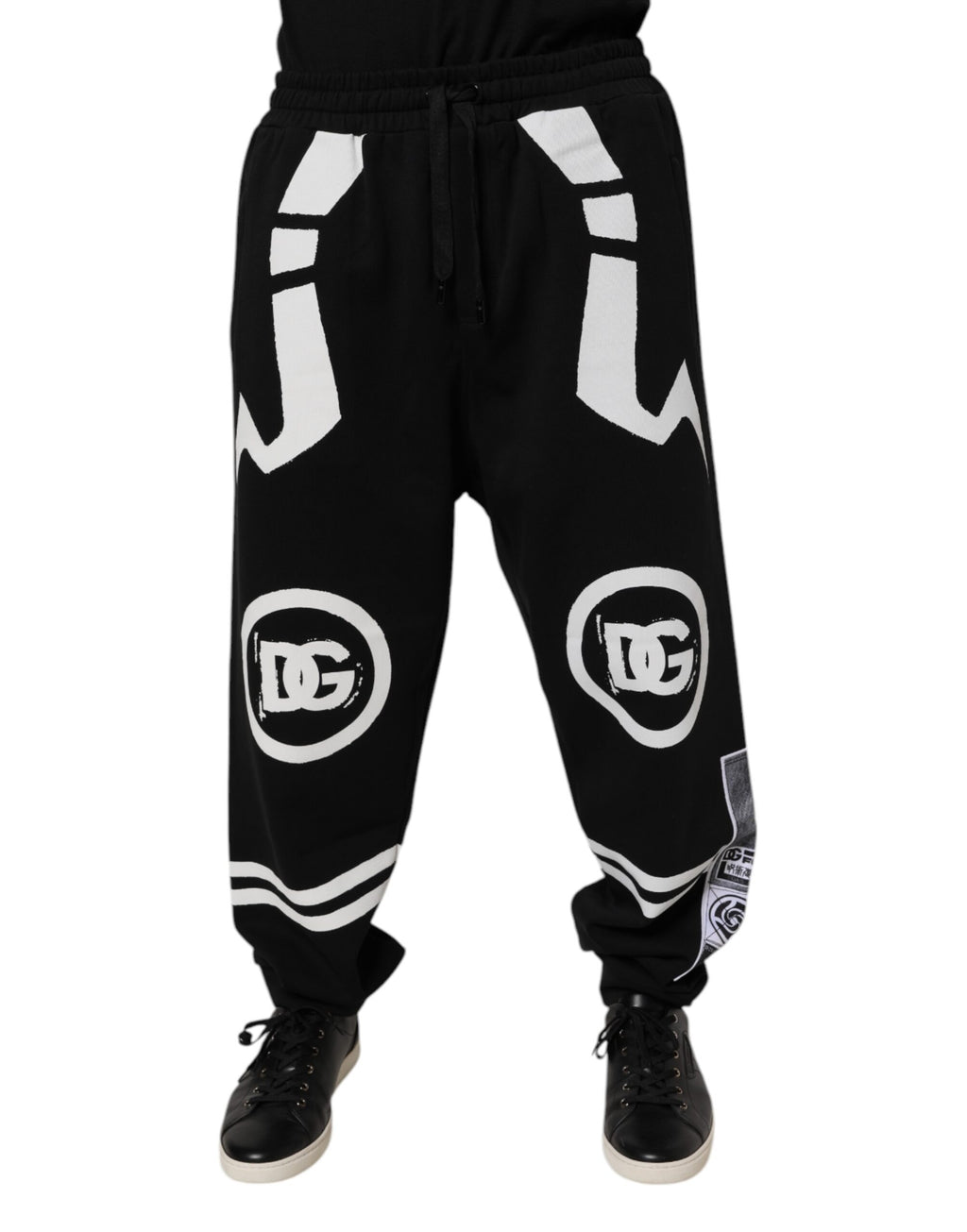 Pantalon de jogging en coton noir Dolce & Gabbana avec logo, look décontracté et confortable, idéal pour le sport ou la détente.