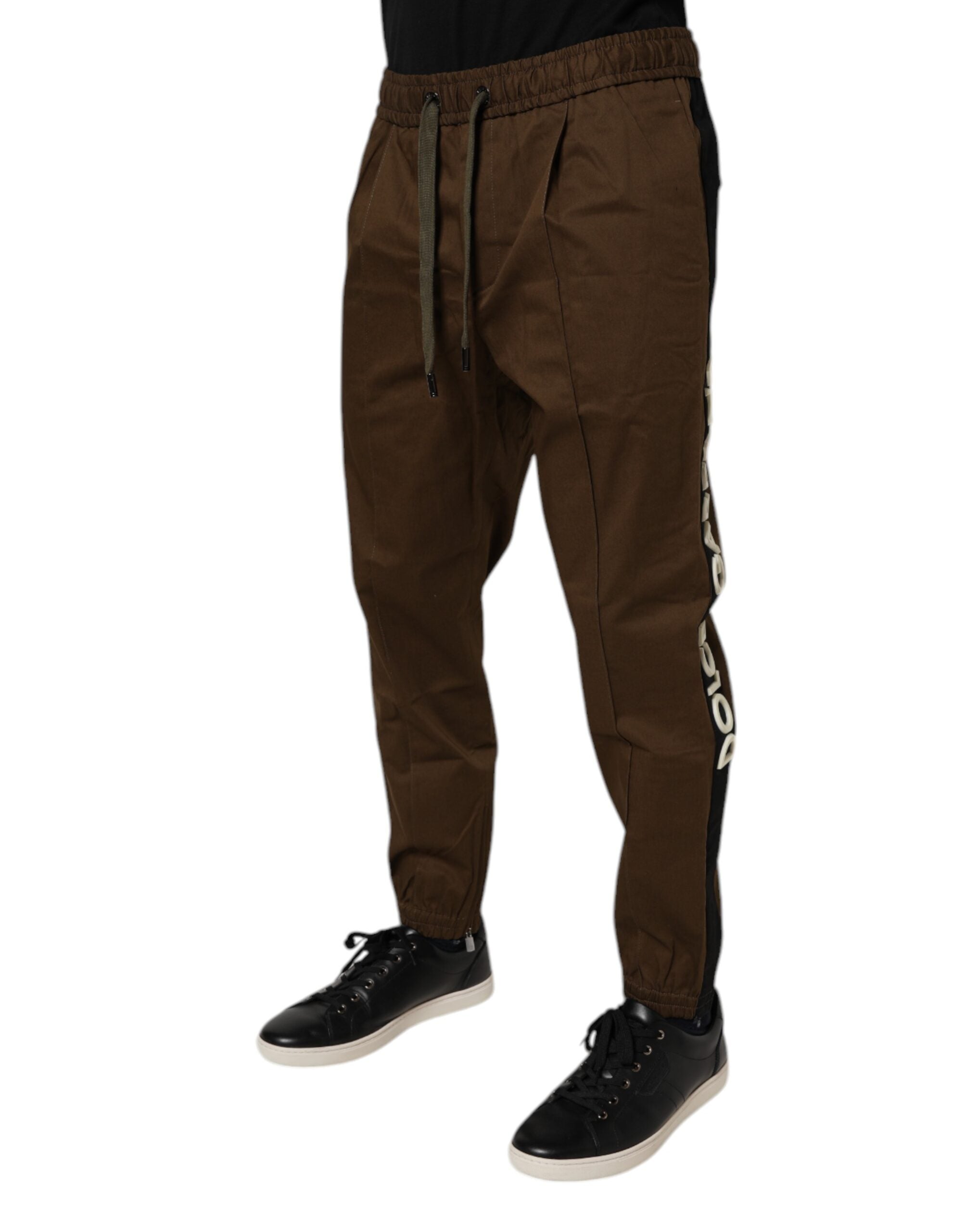 Pantalon de jogging Dolce & Gabbana en coton marron avec stretch, style décontracté et confort, visible sur l'image.
