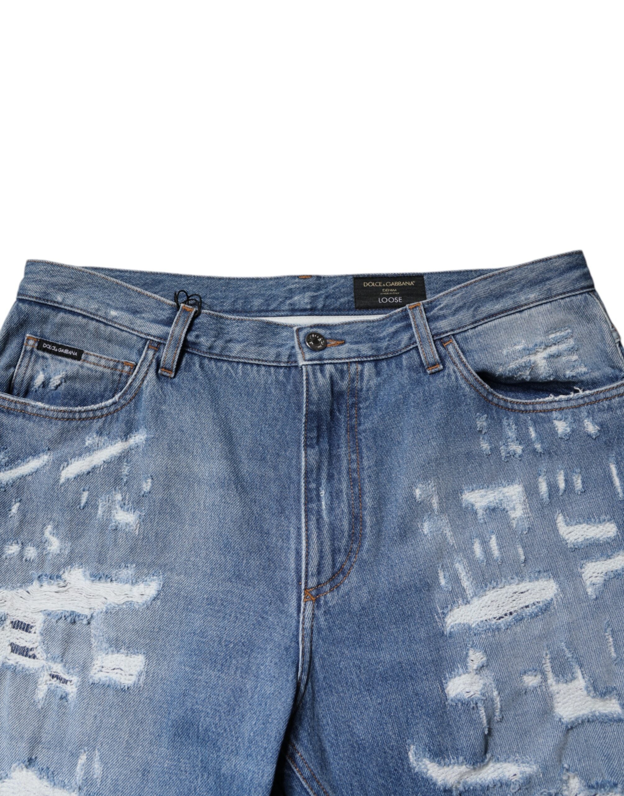 Jeans en denim blanc Dolce & Gabbana, droit et déchiré, en coton avec un style décontracté et tendance.
