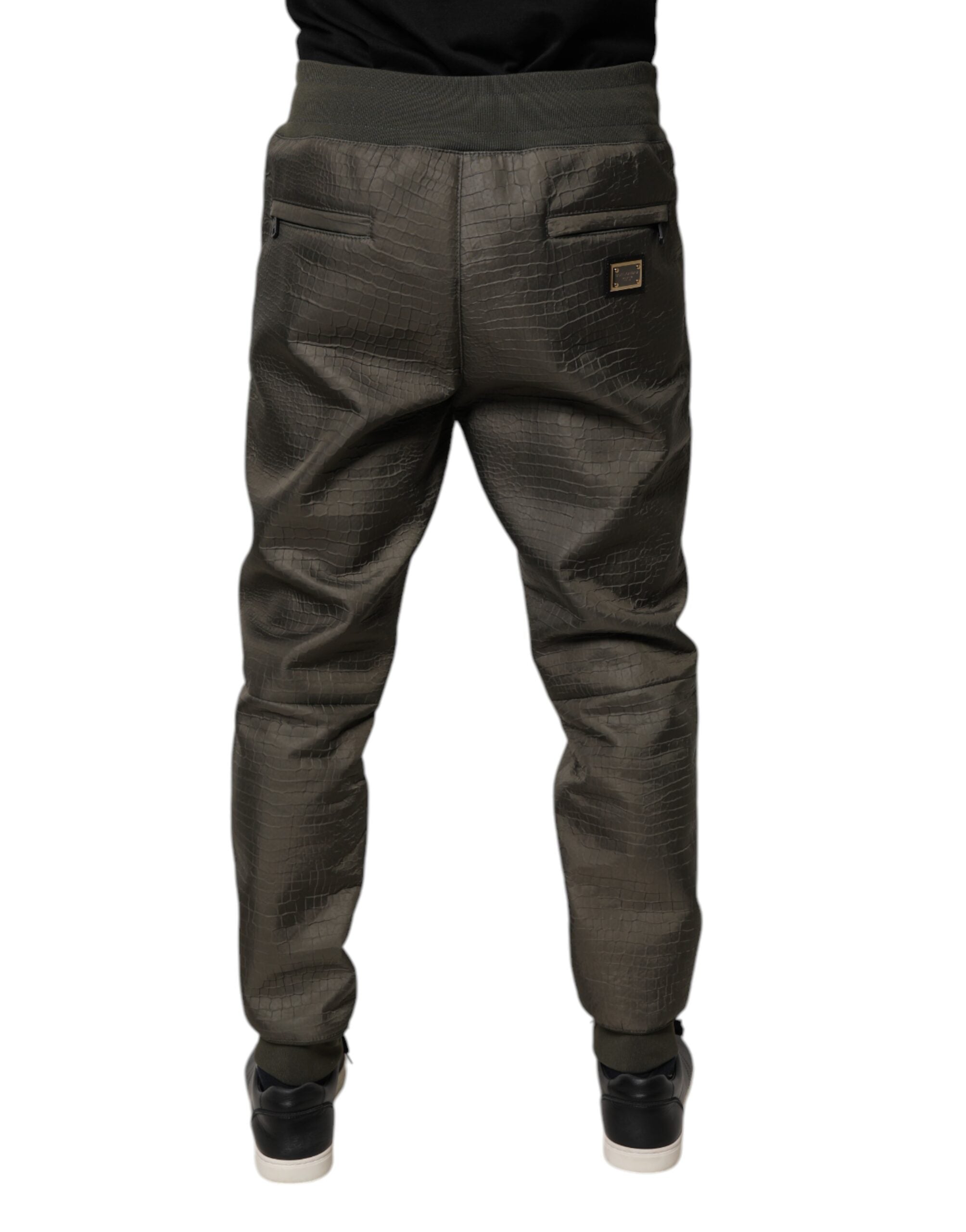 Pantalon de survêtement en cuir d'agneau marron Dolce & Gabbana pour homme, vue de face avec détails de la texture en cuir.