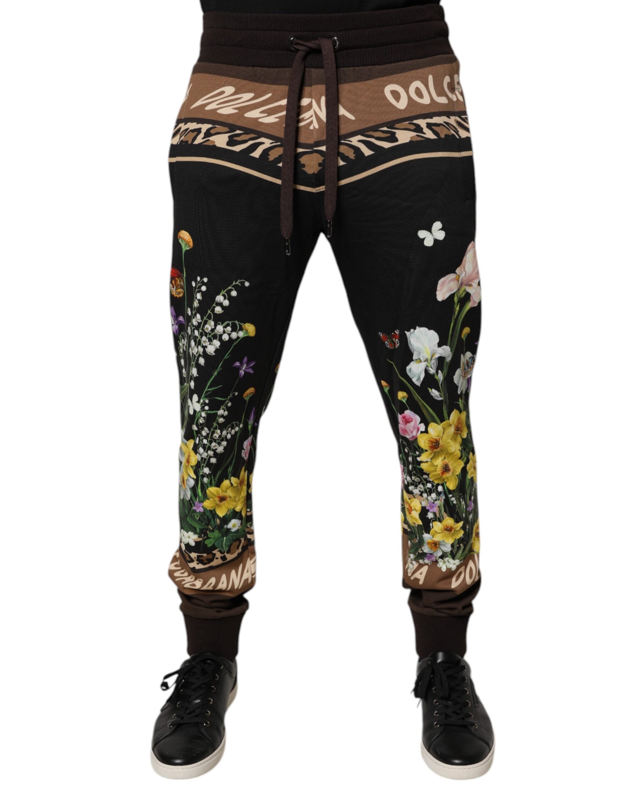 Joggeurs en coton noir à fleurs Dolce & Gabbana, pantalon décontracté avec motif floral et ceinture élastique.