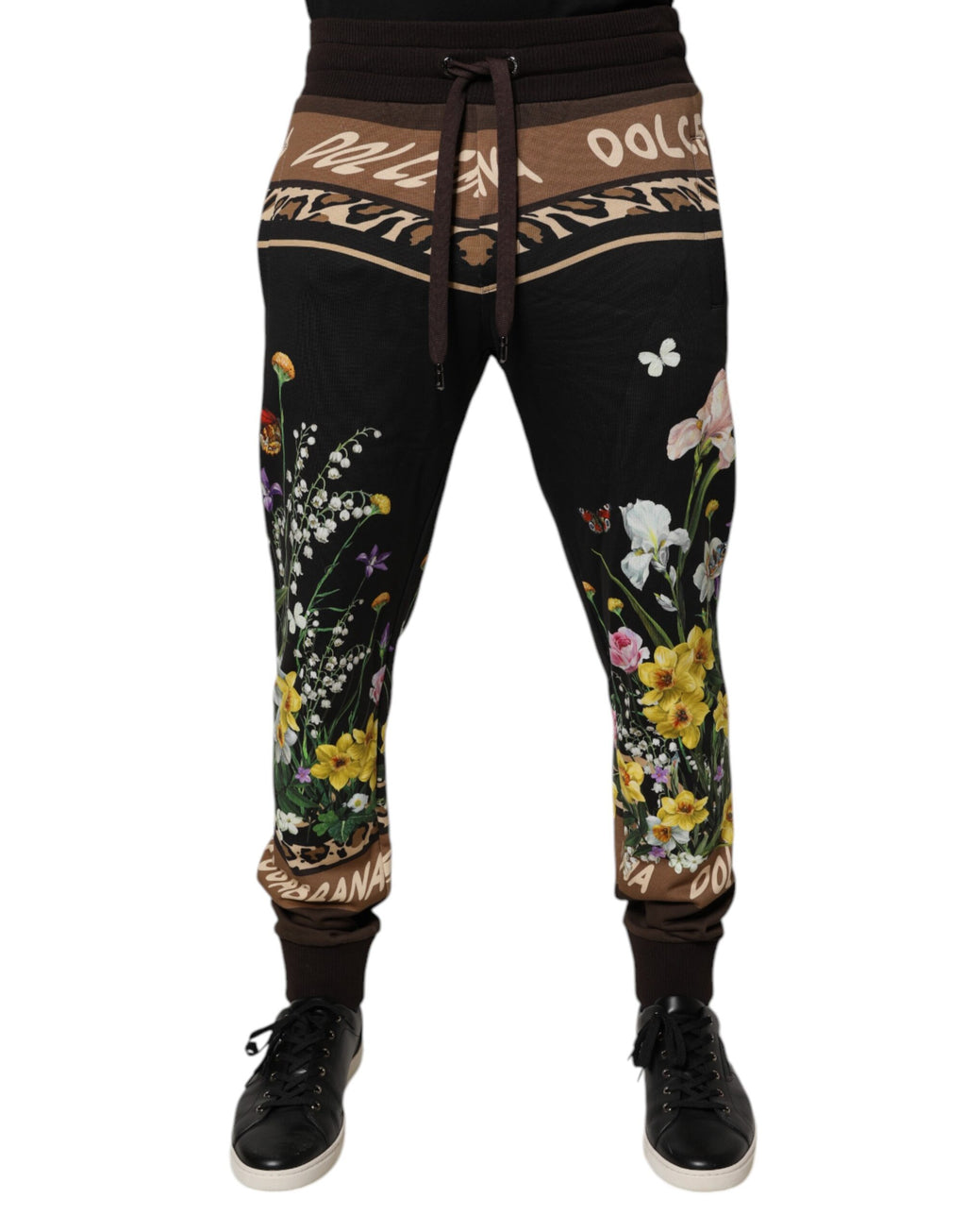 Pantalon jogger Dolce & Gabbana en coton noir avec motifs floraux, style décontracté et confortable.