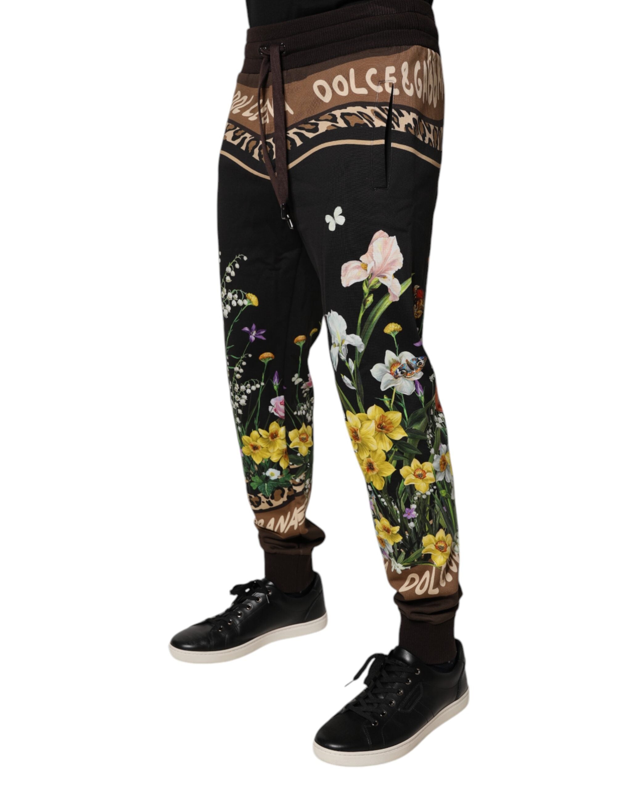 Pantalons de jogging Dolce & Gabbana en coton noir avec motifs floraux, style décontracté et confortable.