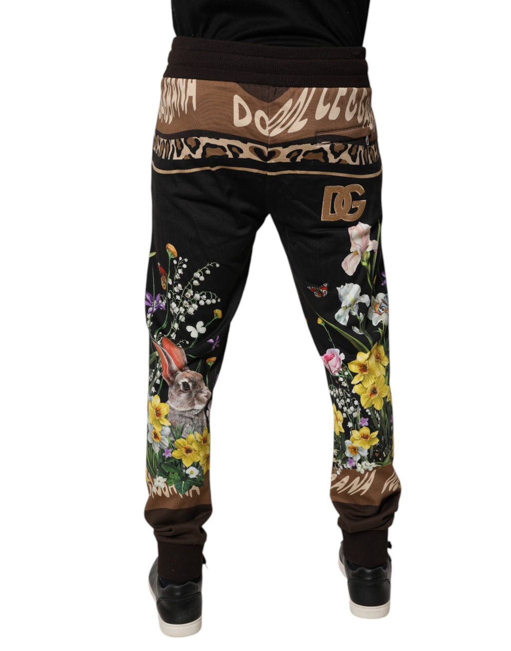 Pantalon de jogger noir Dolce & Gabbana en coton avec motif floral, style décontracté et confortable.