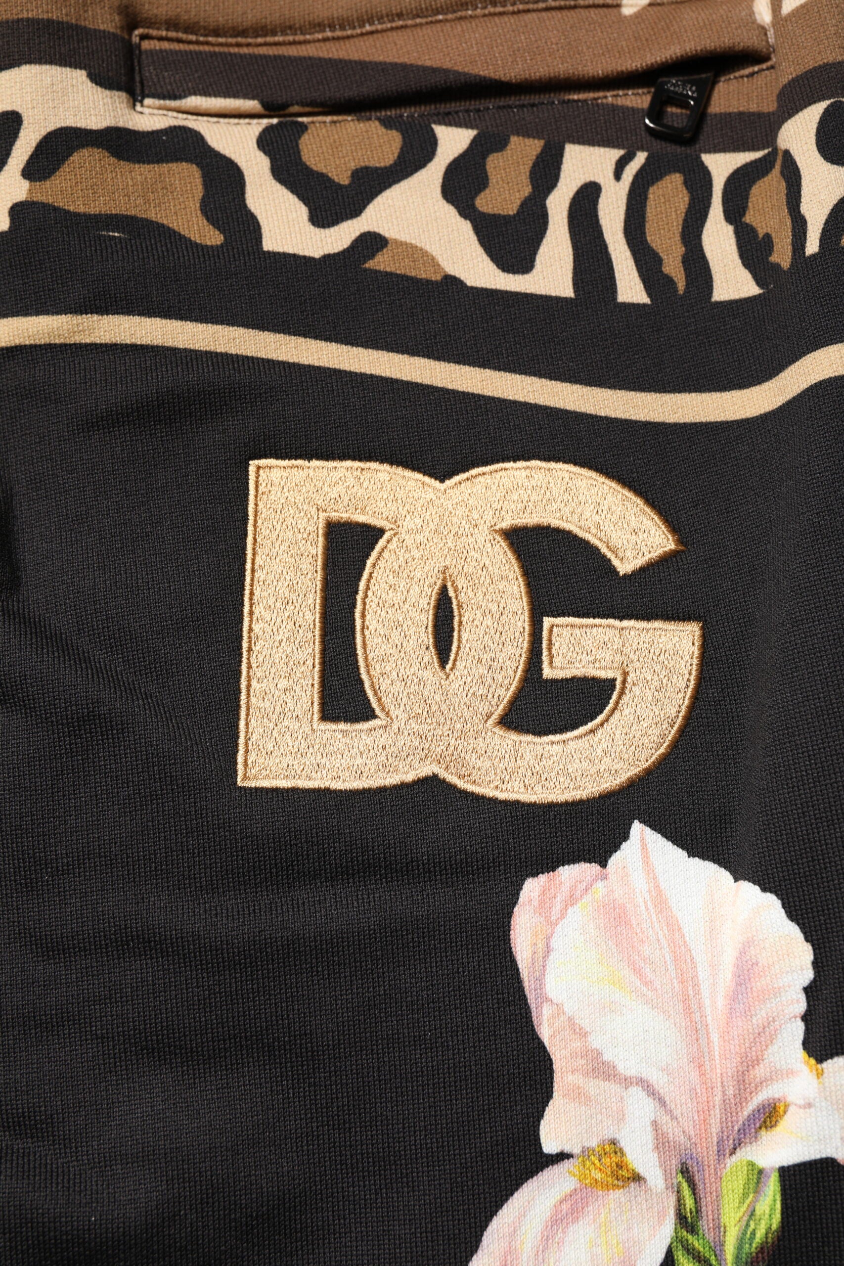 Pantalon de jogging noir Dolce & Gabbana en coton avec motif floral, décontracté et confortable.