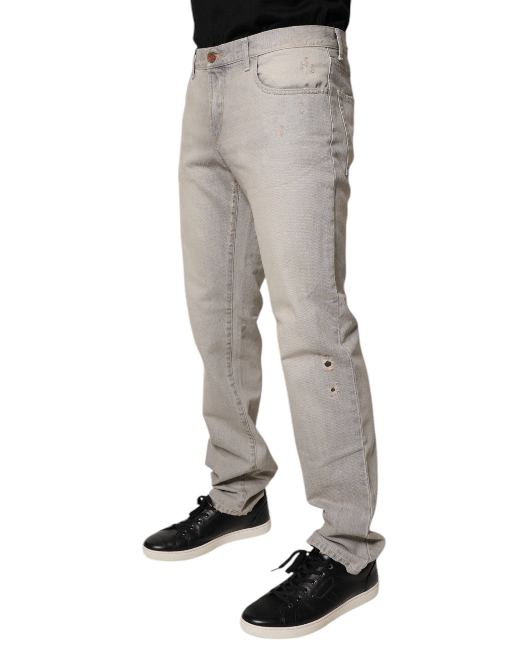 Jeans skinny en denim coton gris clair de Dolce & Gabbana, style ajusté et moderne, visible avec détails de couture.