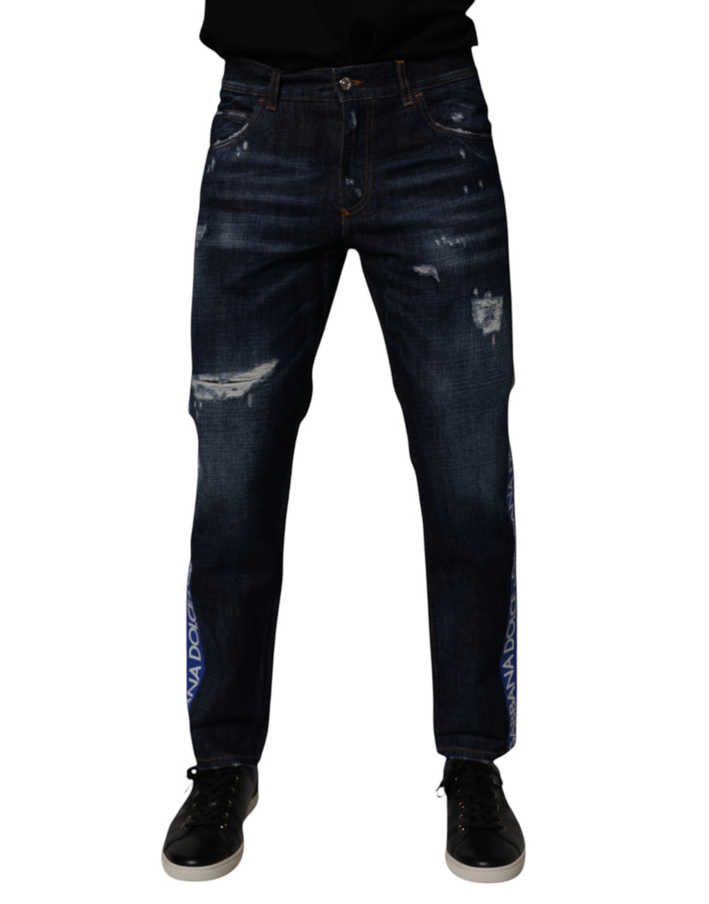 Jeans skinny en coton bleu foncé déchiré de Dolce & Gabbana, style décontracté avec détails usés.