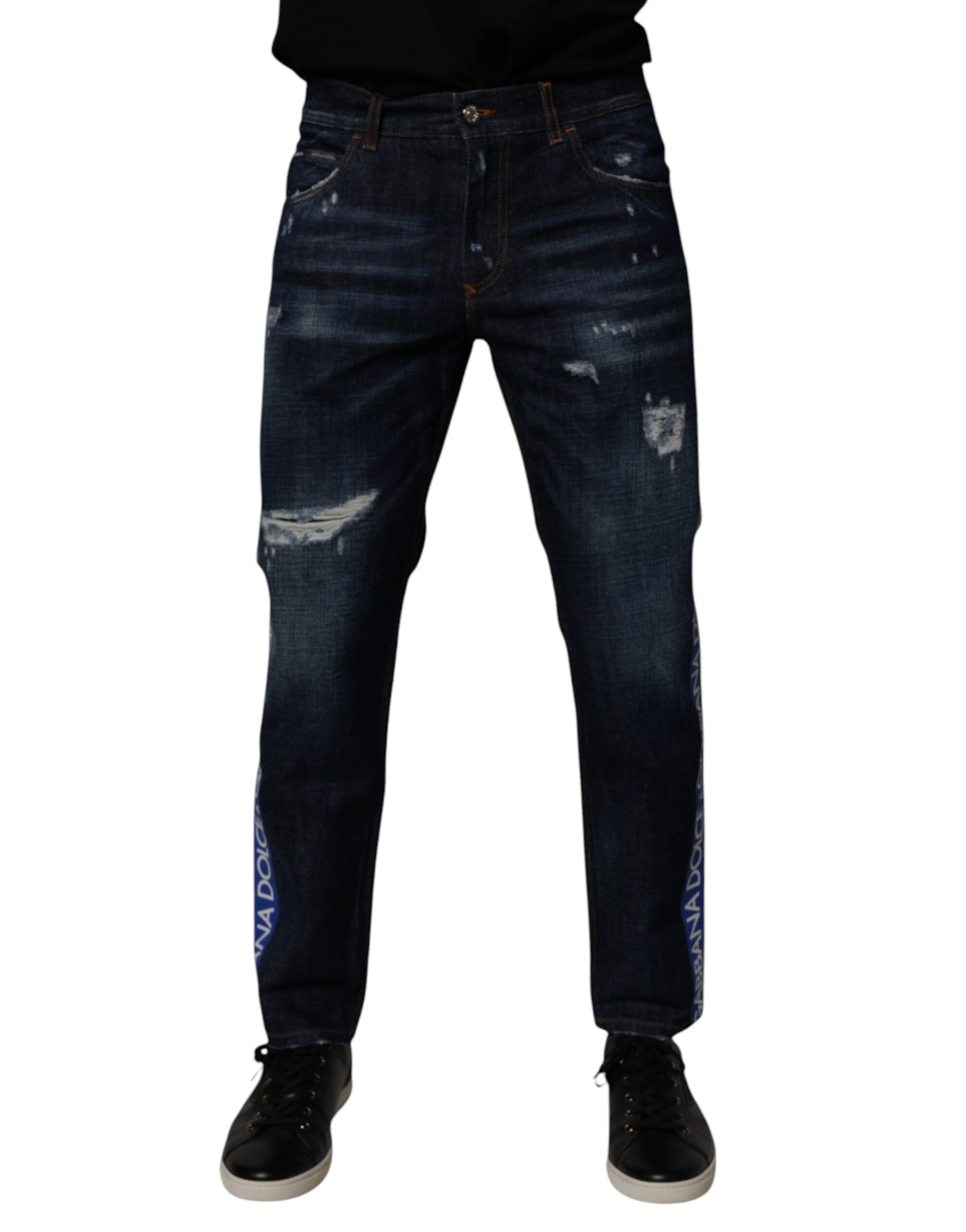 Jeans skinny en coton bleu foncé déchiré de Dolce & Gabbana, style décontracté avec détails usés.