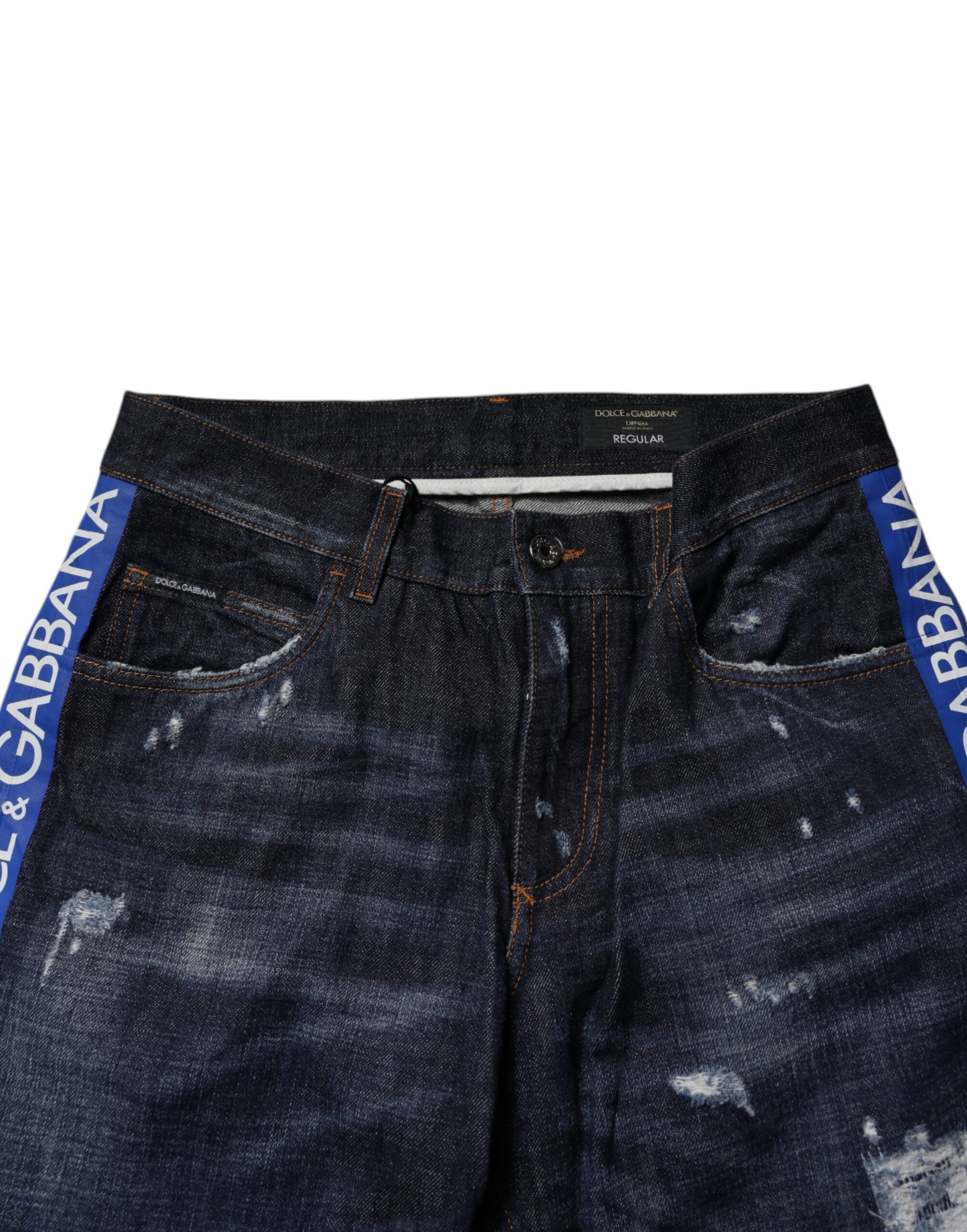 Jeans skinny en denim coton bleu foncé tacheté de Dolce & Gabbana, style déchiré, pour homme.