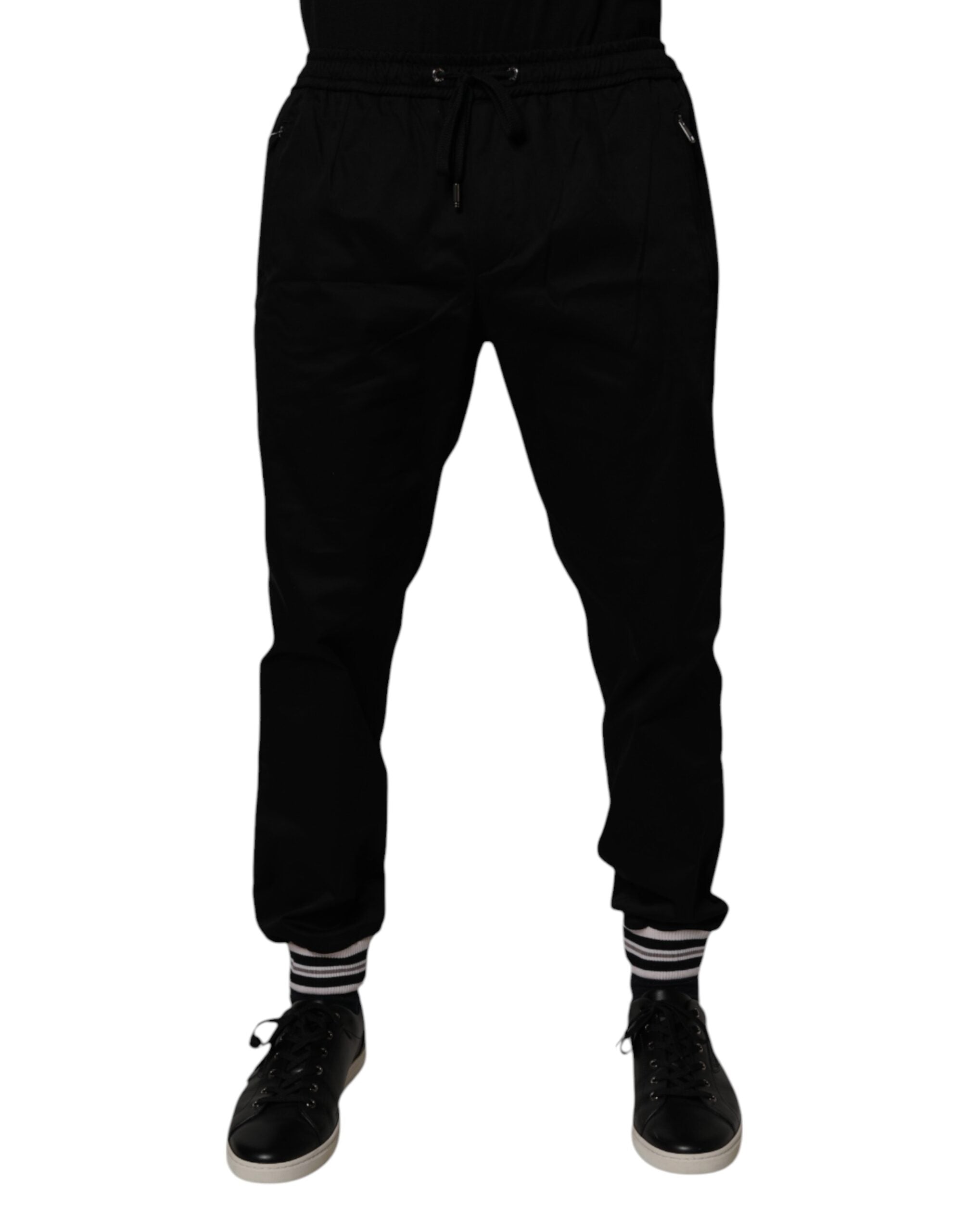 Pantalons de jogging Dolce & Gabbana en coton noir extensible, style décontracté avec poches et couture élégante.