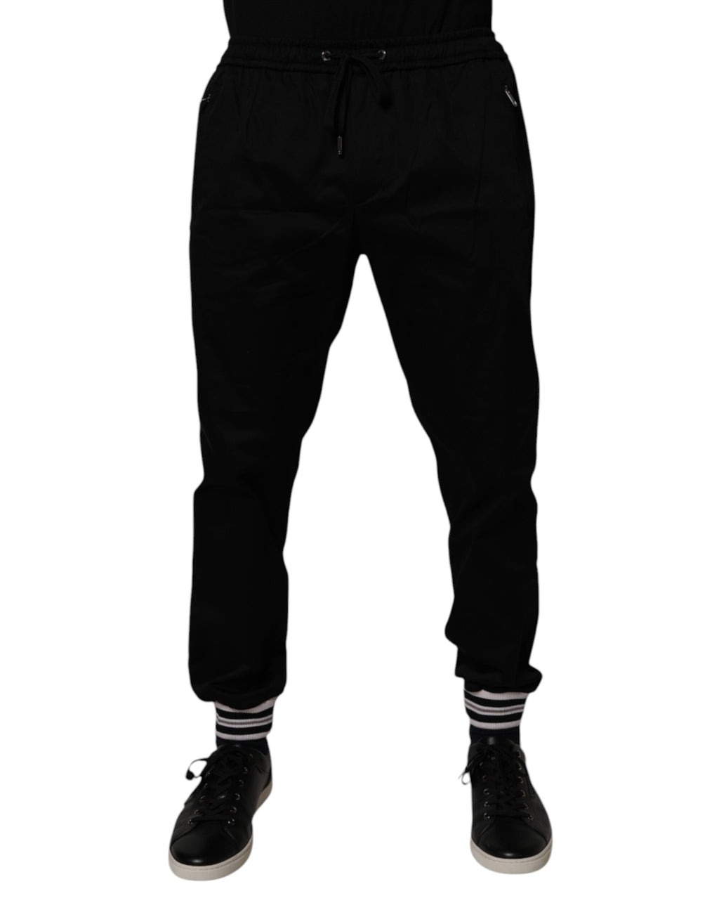 Pantalon de jogging Dolce & Gabbana en coton stretch noir, coupe décontractée et détails modernes visible sur l'image.