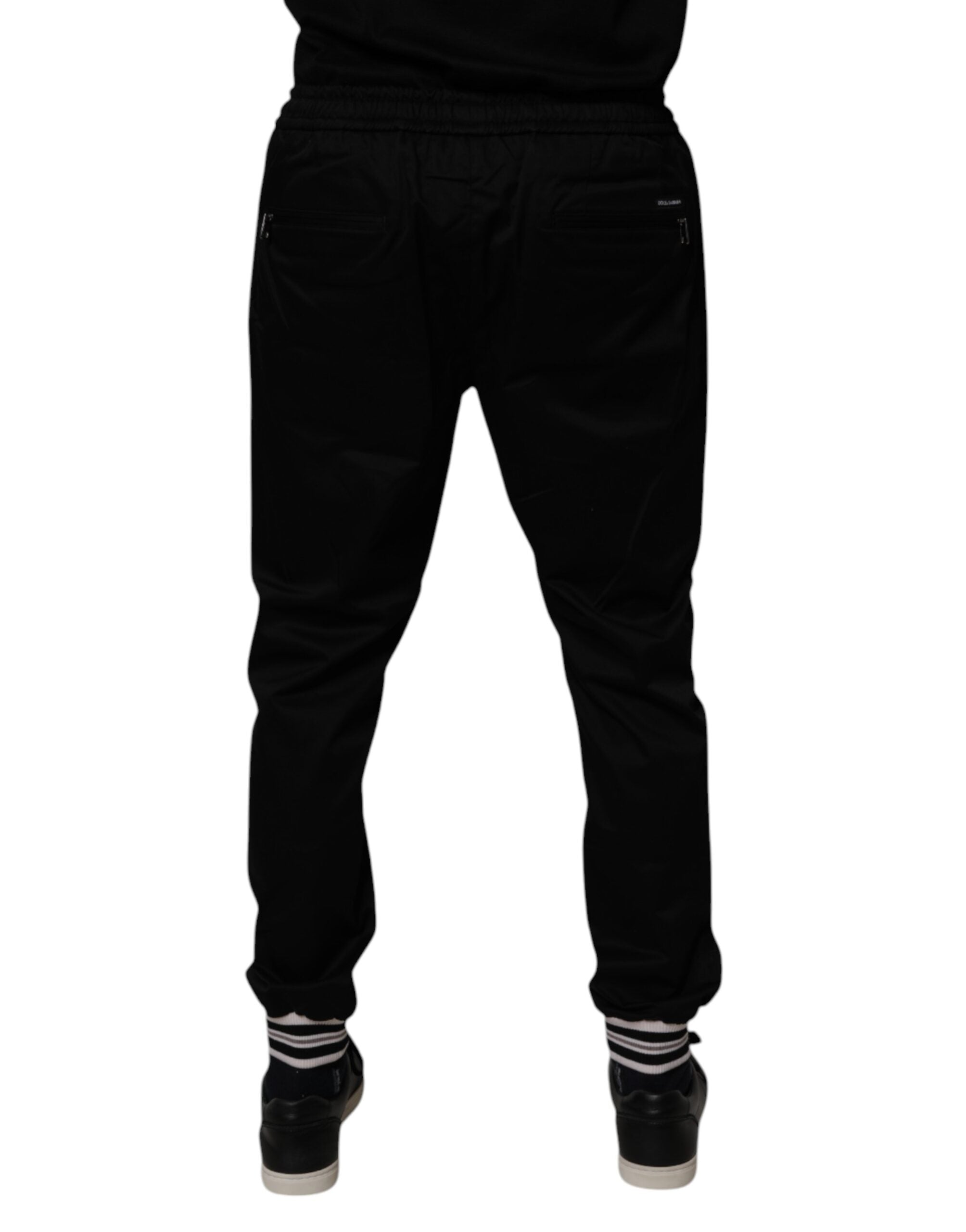 Pantalons de jogging noirs en coton stretch de Dolce & Gabbana, style décontracté avec taille élastique et poches latérales.