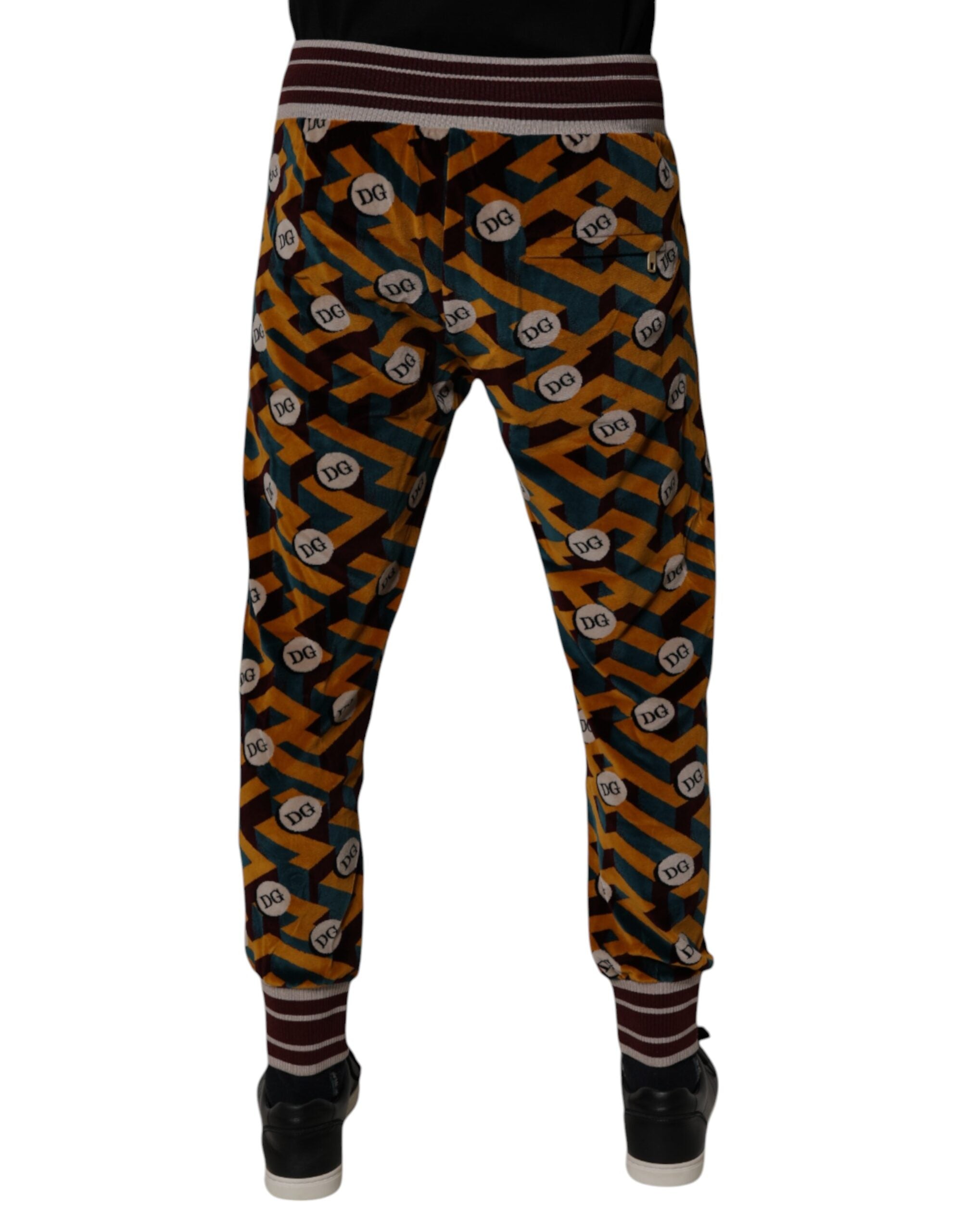 Pantalon de jogging Dolce & Gabbana multicolore avec logo monogramme, style décontracté et confort visible sur l'image.