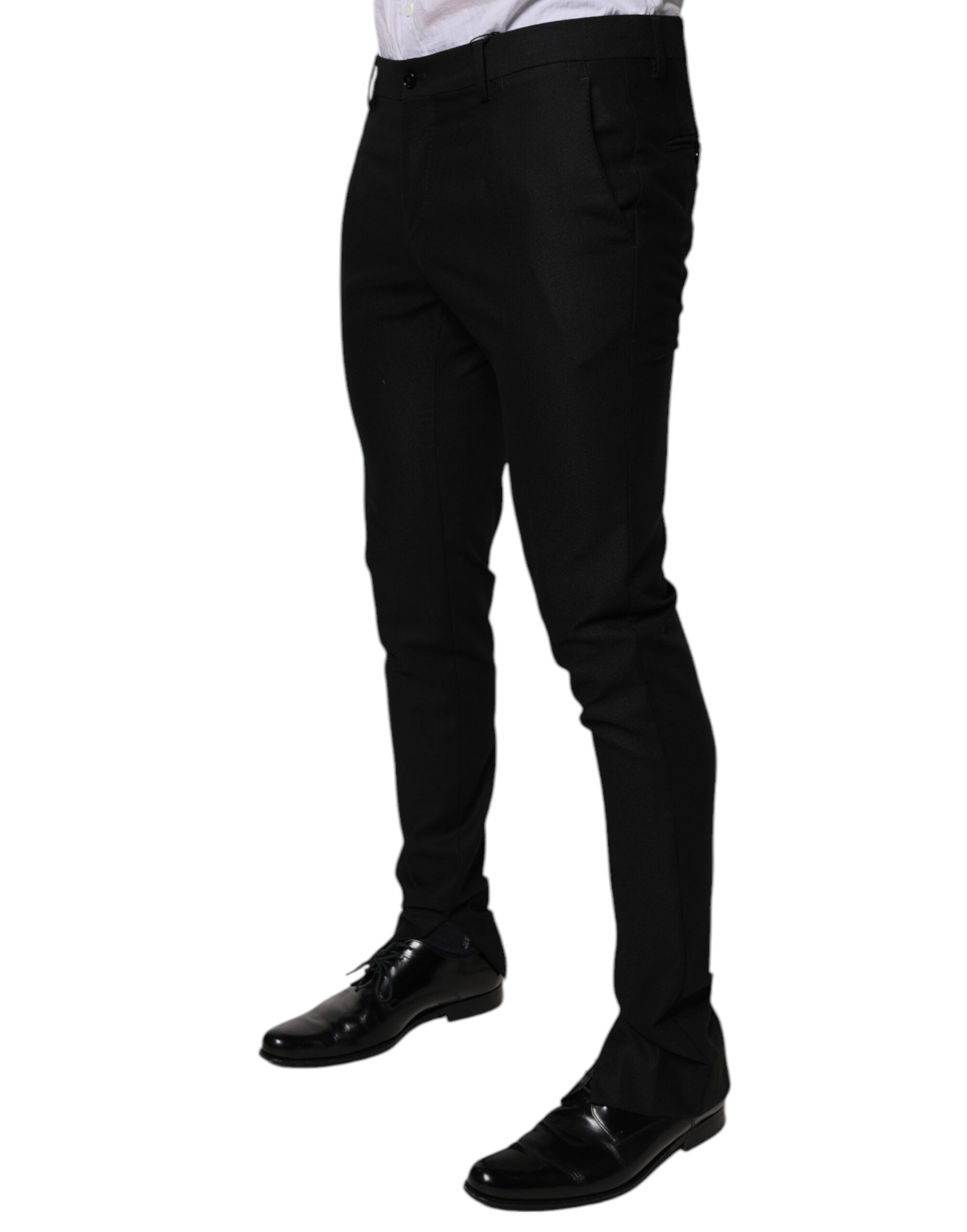 Pantalon homme Dolce & Gabbana en laine vierge noire, coupe skinny, style formel et élégant.