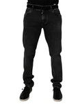 Jeans skinny en coton stretch noir de Dolce & Gabbana pour homme, coupe ajustée et style moderne.
