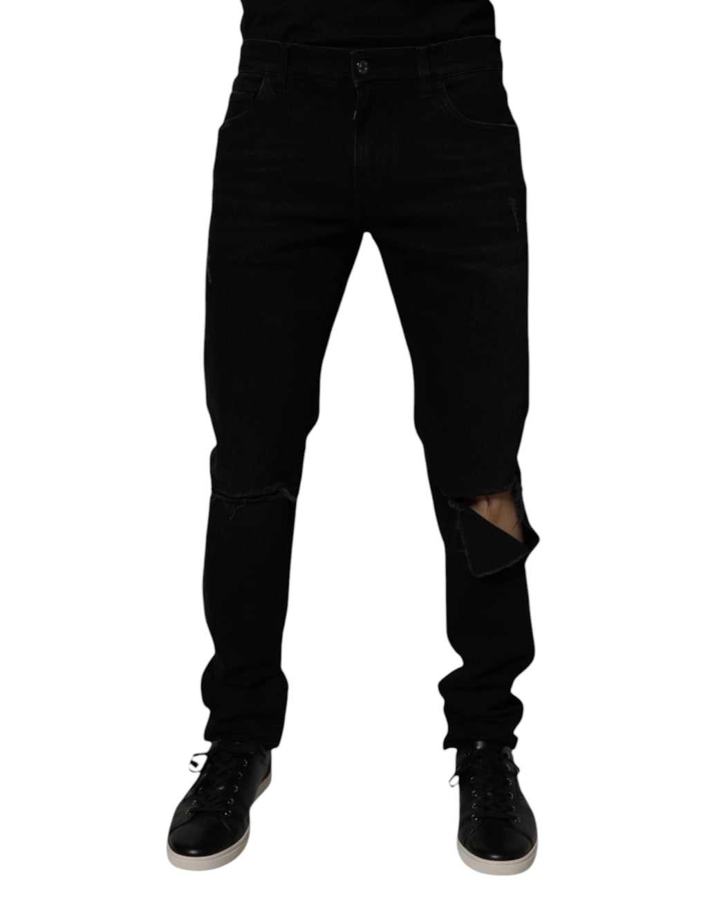 Jeans homme Dolce & Gabbana en coton noir tissé déchiré, coupe skinny, style décontracté avec détails usés.